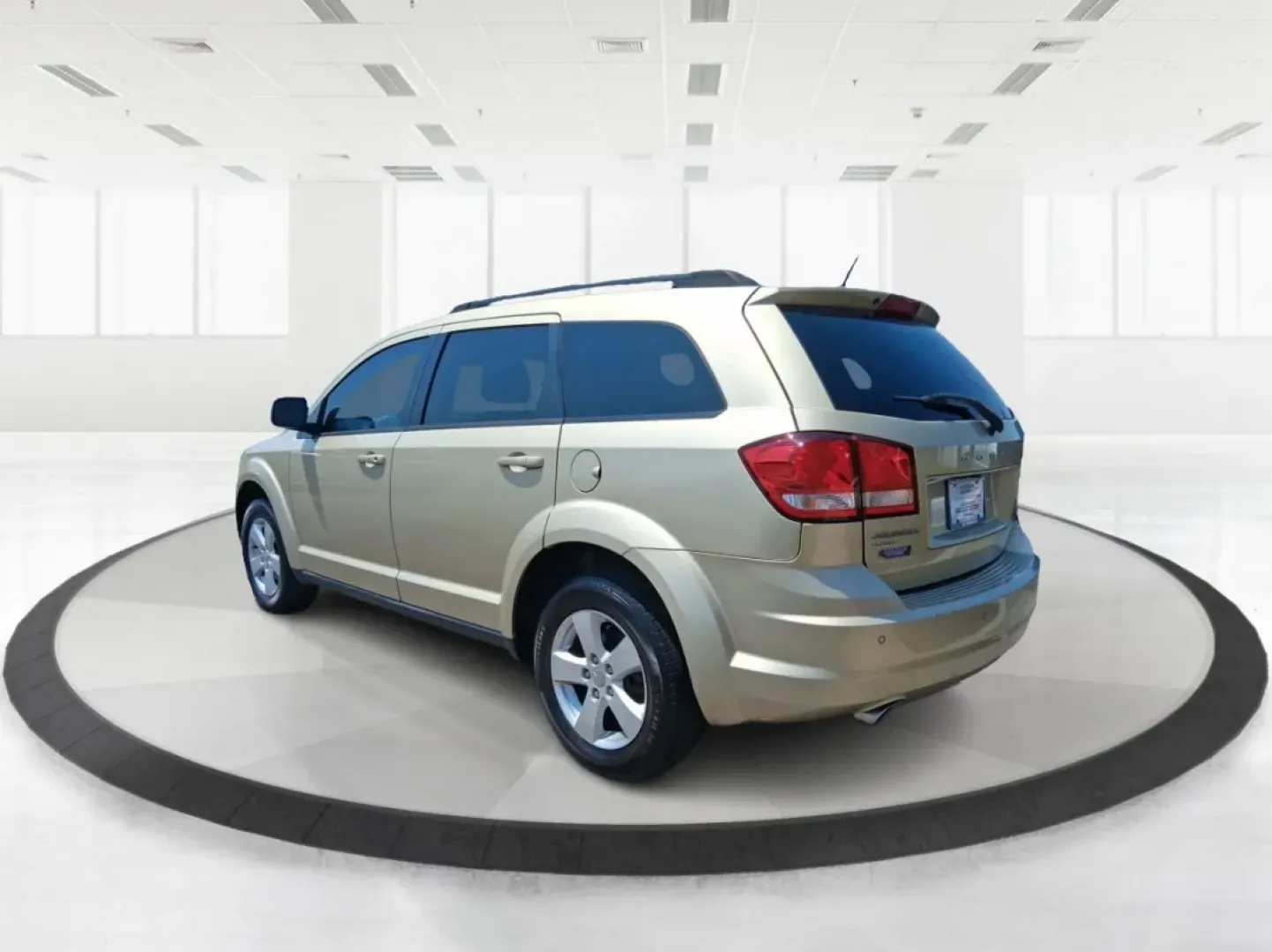 2011 White Gold Dodge Journey Mainstreet (3D4PG1FG9BT) with an 3.6L V6 DOHC 24V engine, 6-Speed Automatic transmission, located at 4508 South Dixie Dr, Moraine, OH, 45439, (937) 908-9800, 39.689976, -84.218452 - Are you in search of a versatile SUV that fits seamlessly into your active lifestyle? Look no further than this 2011 Dodge Journey Mainstreet, available now at Advantage Car and Credit - Moraine, located at 4508 South Dixie Dr, Moraine, OH 45439. This spacious and well-equipped SUV is not just a veh - Photo#4
