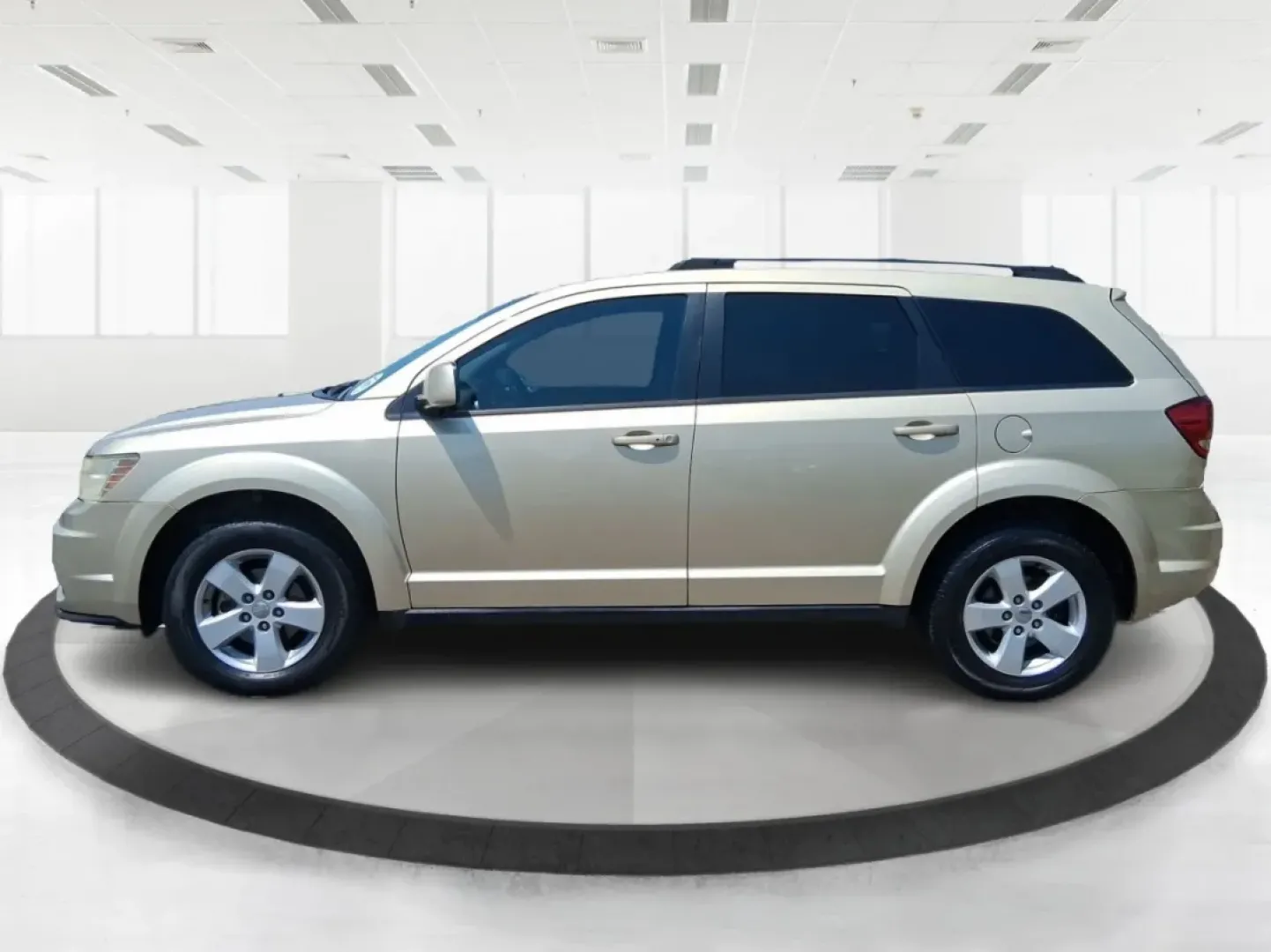 2011 White Gold Dodge Journey Mainstreet (3D4PG1FG9BT) with an 3.6L V6 DOHC 24V engine, 6-Speed Automatic transmission, located at 4508 South Dixie Dr, Moraine, OH, 45439, (937) 908-9800, 39.689976, -84.218452 - Are you in search of a versatile SUV that fits seamlessly into your active lifestyle? Look no further than this 2011 Dodge Journey Mainstreet, available now at Advantage Car and Credit - Moraine, located at 4508 South Dixie Dr, Moraine, OH 45439. This spacious and well-equipped SUV is not just a veh - Photo#5