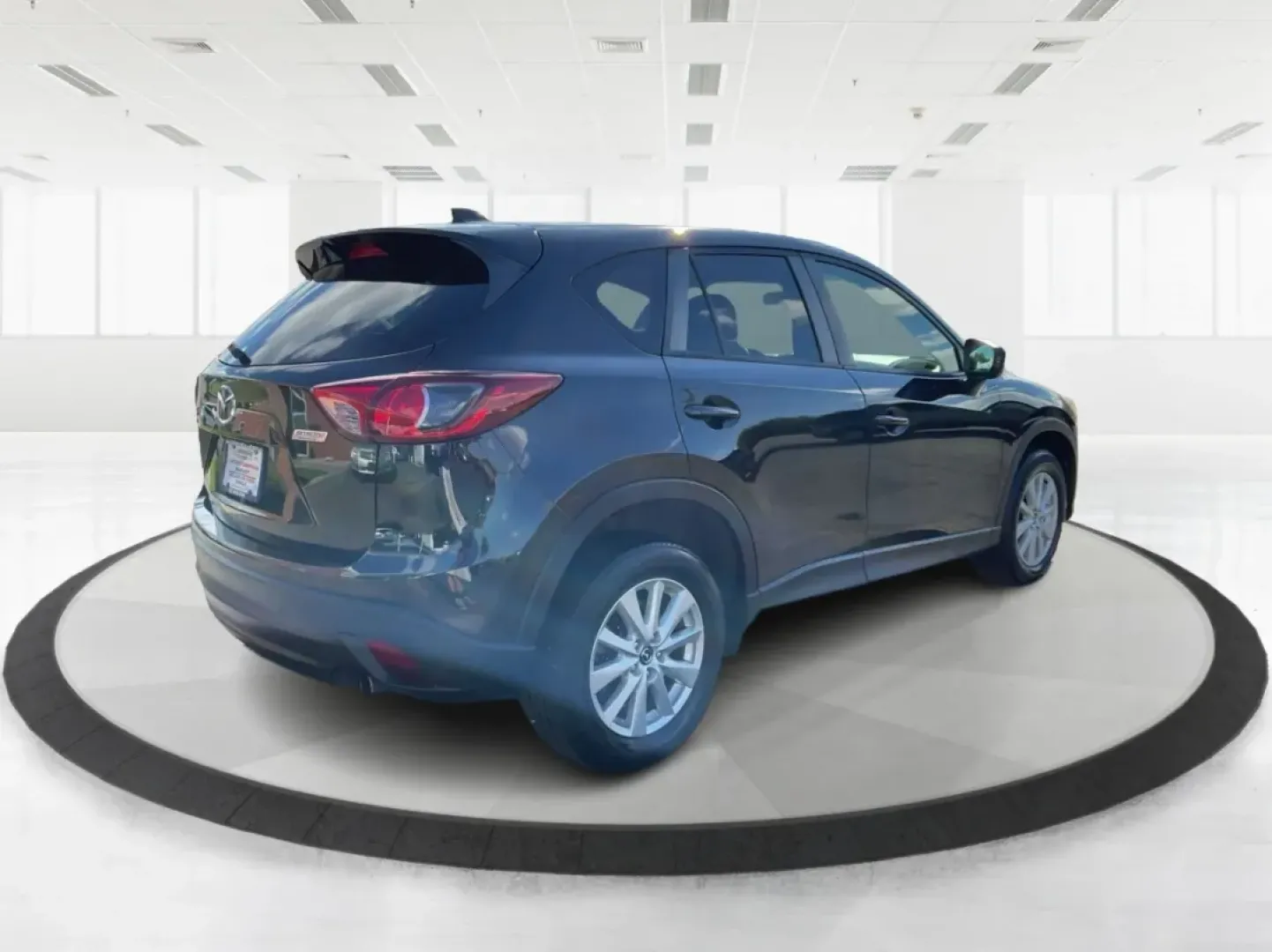 2014 Jet Black Mica Mazda CX-5 Touring AWD (JM3KE4CY2E0) with an 2.5L L4 DOHC 16V engine, 6-Speed Automatic transmission, located at 1099 N County Rd 25A , Troy, OH, 45373, (937) 908-9800, 40.057079, -84.212883 - **Explore the Open Road in the 2014 Mazda CX-5 Touring AWD from Advantage Car and Credit - Troy!**<br /> <br /> Are you ready to elevate your driving experience? Whether you're a growing family seeking a reliable SUV for weekend adventures, a commuter looking for comfort on long drives, or a budget- - Photo#2