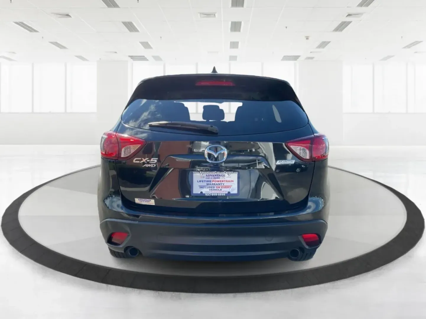 2014 Jet Black Mica Mazda CX-5 Touring AWD (JM3KE4CY2E0) with an 2.5L L4 DOHC 16V engine, 6-Speed Automatic transmission, located at 1099 N County Rd 25A , Troy, OH, 45373, (937) 908-9800, 40.057079, -84.212883 - **Explore the Open Road in the 2014 Mazda CX-5 Touring AWD from Advantage Car and Credit - Troy!**<br /> <br /> Are you ready to elevate your driving experience? Whether you're a growing family seeking a reliable SUV for weekend adventures, a commuter looking for comfort on long drives, or a budget- - Photo#3