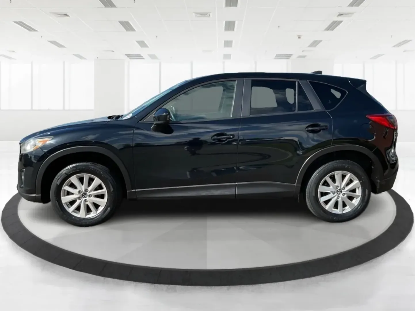 2014 Jet Black Mica Mazda CX-5 Touring AWD (JM3KE4CY2E0) with an 2.5L L4 DOHC 16V engine, 6-Speed Automatic transmission, located at 1099 N County Rd 25A , Troy, OH, 45373, (937) 908-9800, 40.057079, -84.212883 - **Explore the Open Road in the 2014 Mazda CX-5 Touring AWD from Advantage Car and Credit - Troy!**<br /> <br /> Are you ready to elevate your driving experience? Whether you're a growing family seeking a reliable SUV for weekend adventures, a commuter looking for comfort on long drives, or a budget- - Photo#5