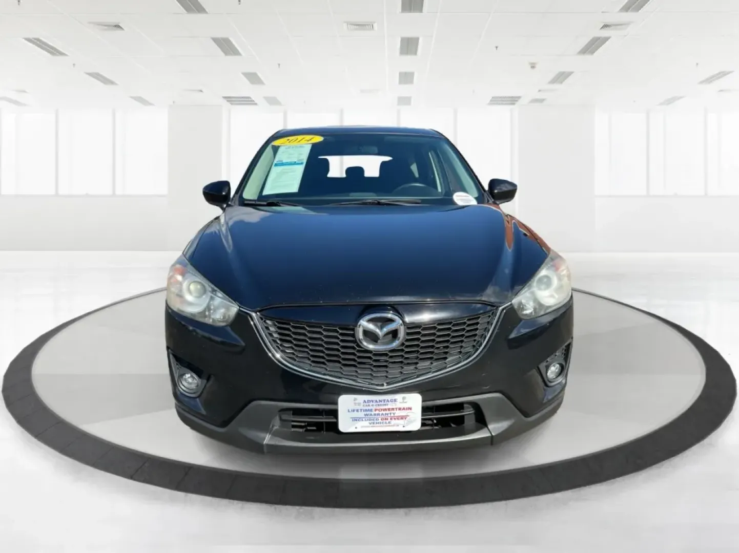 2014 Jet Black Mica Mazda CX-5 Touring AWD (JM3KE4CY2E0) with an 2.5L L4 DOHC 16V engine, 6-Speed Automatic transmission, located at 1099 N County Rd 25A , Troy, OH, 45373, (937) 908-9800, 40.057079, -84.212883 - **Explore the Open Road in the 2014 Mazda CX-5 Touring AWD from Advantage Car and Credit - Troy!**<br /> <br /> Are you ready to elevate your driving experience? Whether you're a growing family seeking a reliable SUV for weekend adventures, a commuter looking for comfort on long drives, or a budget- - Photo#7