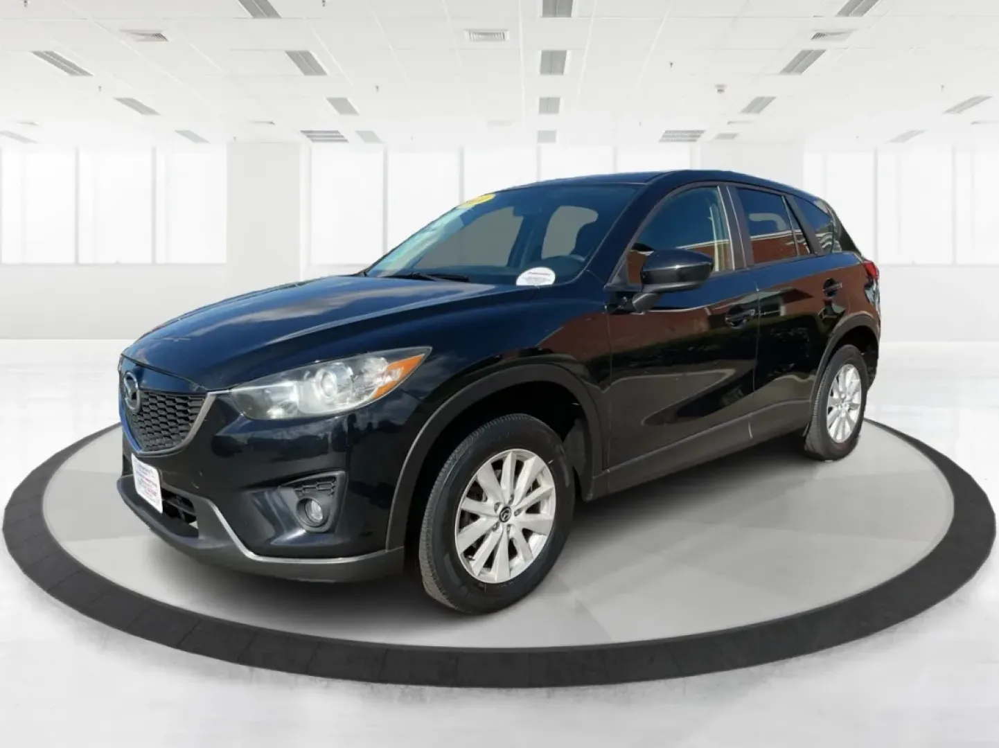 2014 Jet Black Mica Mazda CX-5 Touring AWD (JM3KE4CY2E0) with an 2.5L L4 DOHC 16V engine, 6-Speed Automatic transmission, located at 1099 N County Rd 25A , Troy, OH, 45373, (937) 908-9800, 40.057079, -84.212883 - **Explore the Open Road in the 2014 Mazda CX-5 Touring AWD from Advantage Car and Credit - Troy!**<br /> <br /> Are you ready to elevate your driving experience? Whether you're a growing family seeking a reliable SUV for weekend adventures, a commuter looking for comfort on long drives, or a budget- - Photo#8