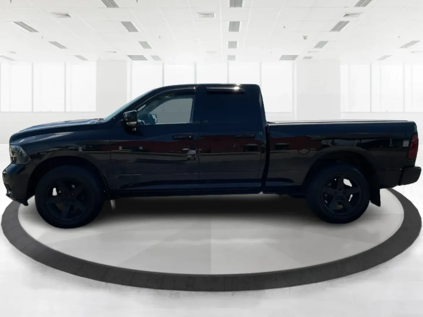 2012 Black Ram 1500 Sport Quad Cab 4WD (1C6RD7HT2CS) with an 5.7L V8 OHV 16V engine, 6-Speed Automatic transmission, located at 1230 East Main St, Xenia, OH, 45385, (937) 908-9800, 39.688026, -83.910172 - 2012 Ram 1500 Sport Quad Cab 4WD - Photo#5