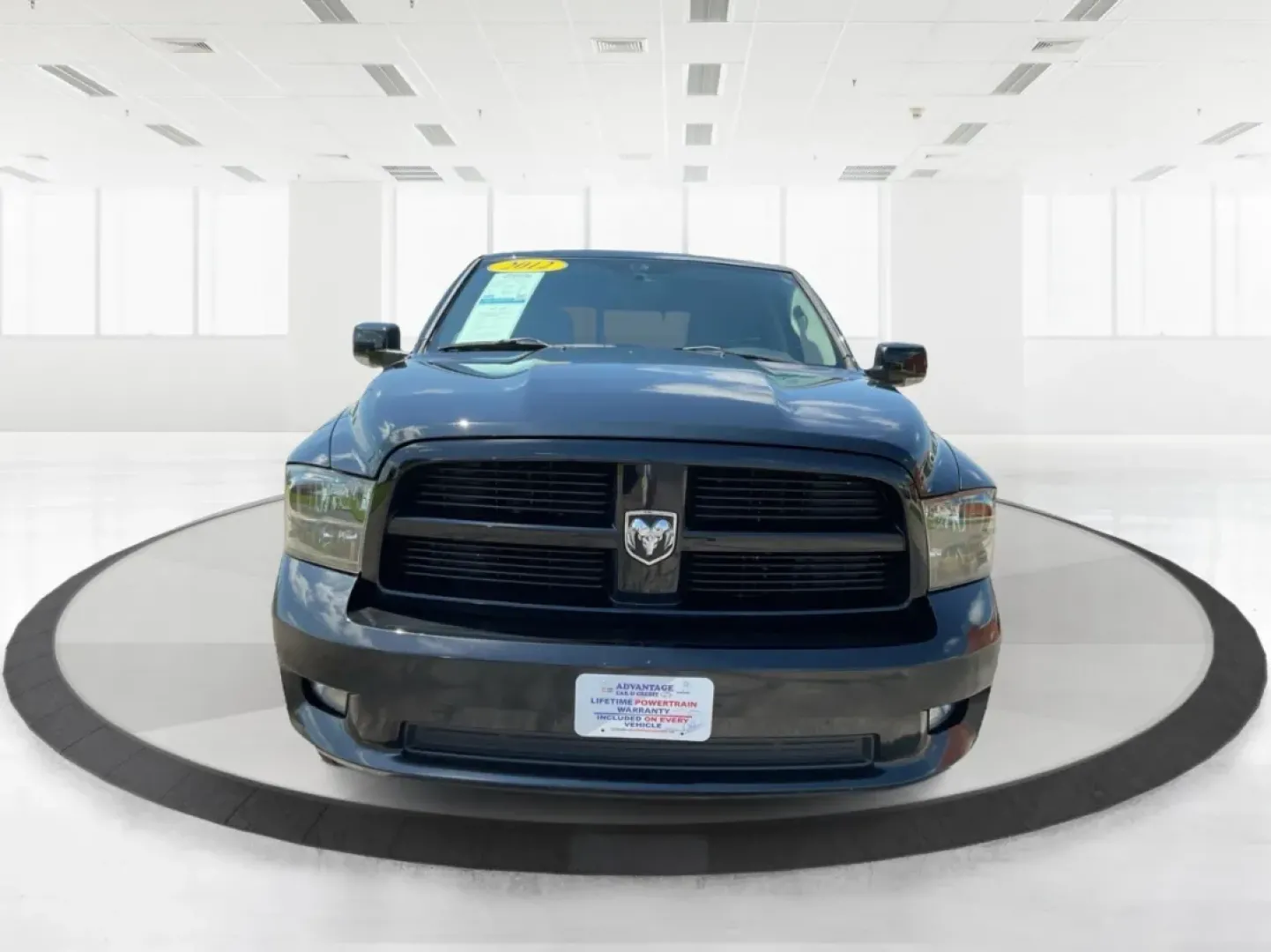 2012 Black Ram 1500 Sport Quad Cab 4WD (1C6RD7HT2CS) with an 5.7L V8 OHV 16V engine, 6-Speed Automatic transmission, located at 1230 East Main St, Xenia, OH, 45385, (937) 908-9800, 39.688026, -83.910172 - 2012 Ram 1500 Sport Quad Cab 4WD - Photo#7