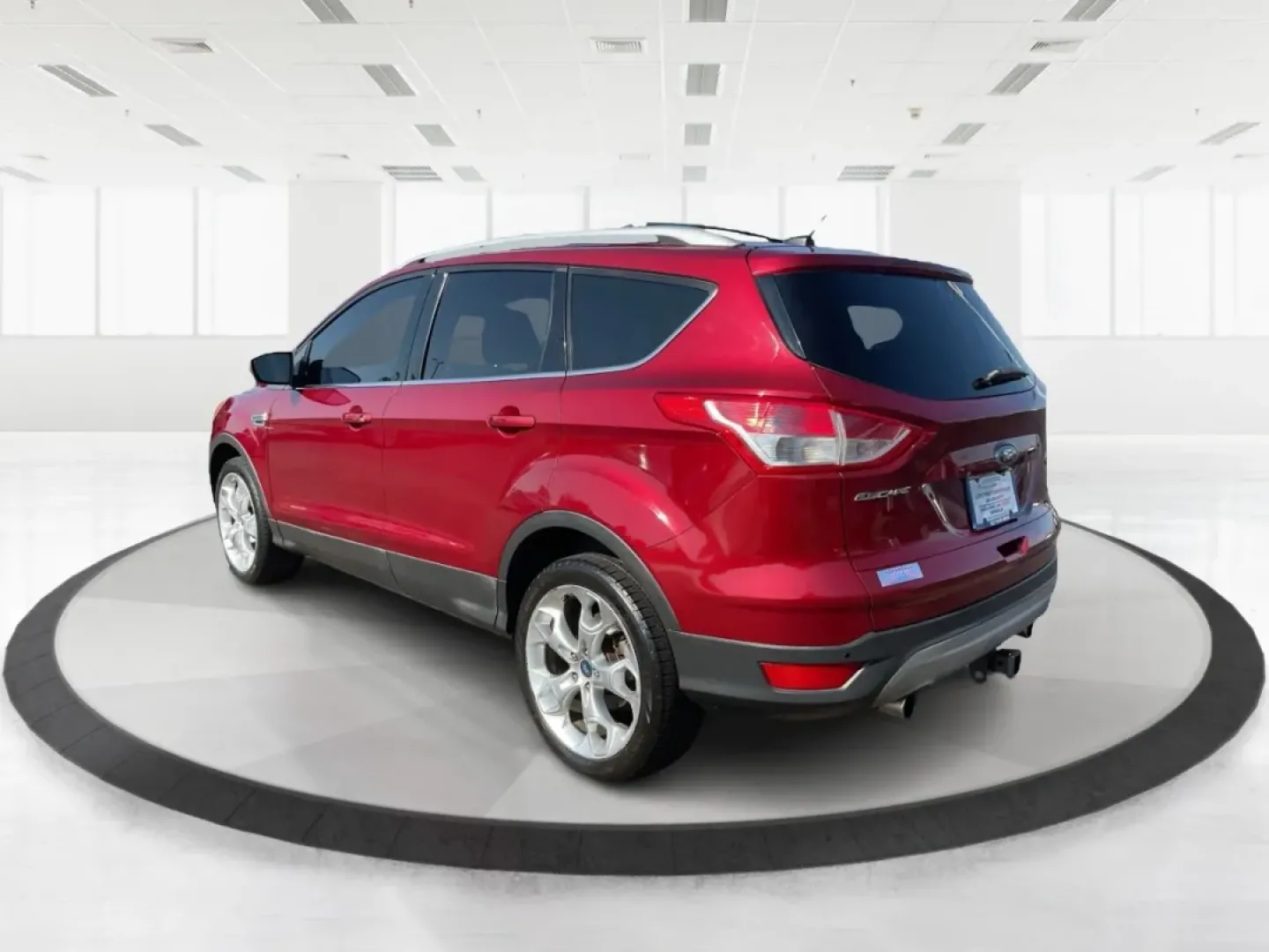 2013 Ruby Red Metallic Tinted Ford Escape Titanium 4WD (1FMCU9J92DU) with an 2.0L L4 DOHC 16V engine, 6-Speed Automatic transmission, located at 4508 South Dixie Dr, Moraine, OH, 45439, (937) 908-9800, 39.689976, -84.218452 - **Discover Your Next Adventure with the 2013 Ford Escape Titanium 4WD!**<br /> <br /> Looking for a reliable SUV that fits your adventurous lifestyle? The 2013 Ford Escape Titanium 4WD is perfect for those who love weekend getaways, family road trips, or tackling daily commutes with style and comfor - Photo#4