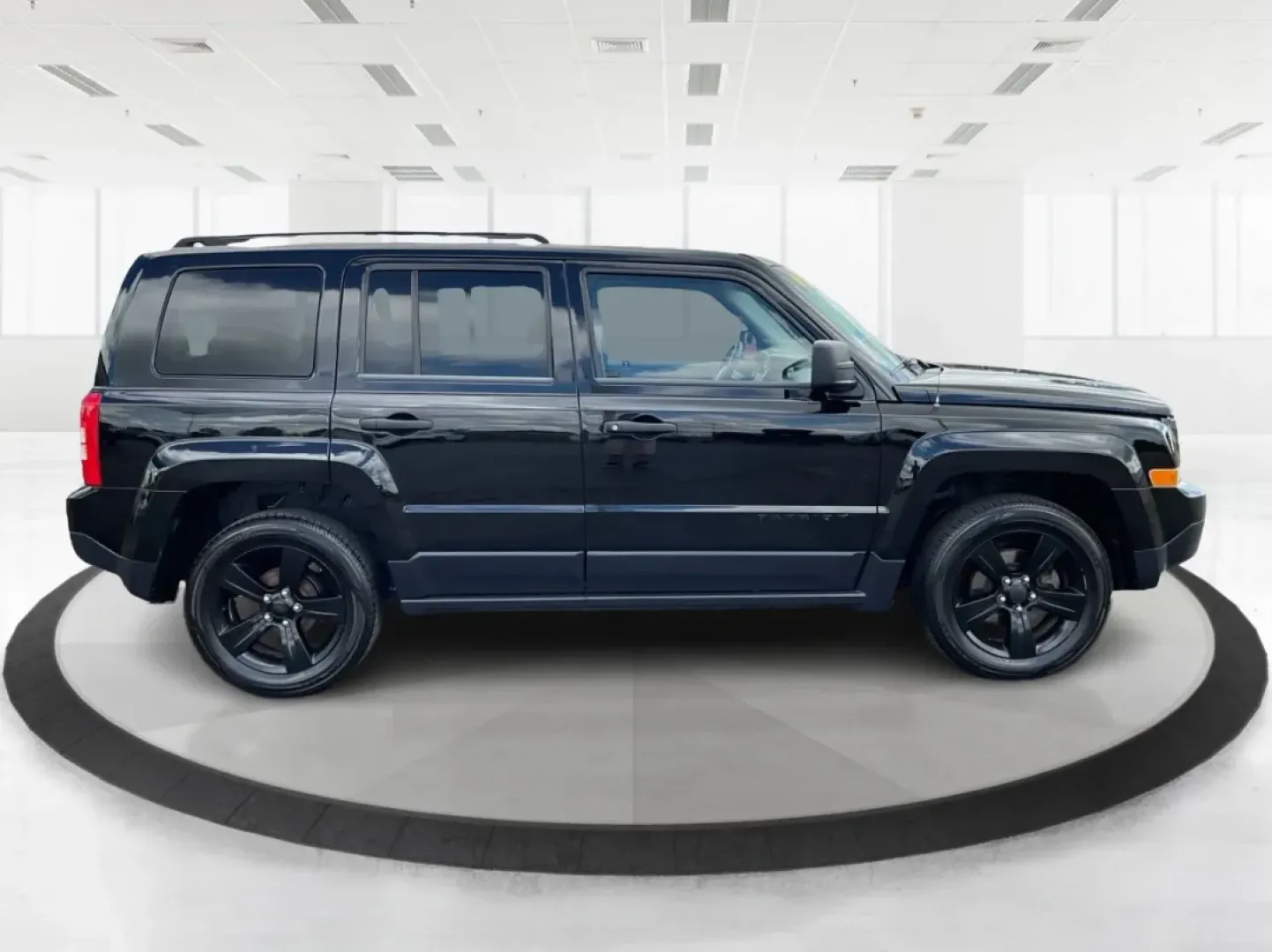 2015 Black Clearcoat Jeep Patriot Sport 2WD (1C4NJPBA6FD) with an 2.0L L4 DOHC 16V engine, located at 1099 N County Rd 25A , Troy, OH, 45373, (937) 908-9800, 40.057079, -84.212883 - **Adventure Awaits in the 2015 Jeep Patriot Your Perfect Companion for Weekend Getaways!**<br /> <br /> Imagine hitting the open road with the wind in your hair, the sound of your favorite playlist filling the cabin, and the freedom to explore every hidden gem along the way. The 2015 Jeep Patriot i - Photo#1