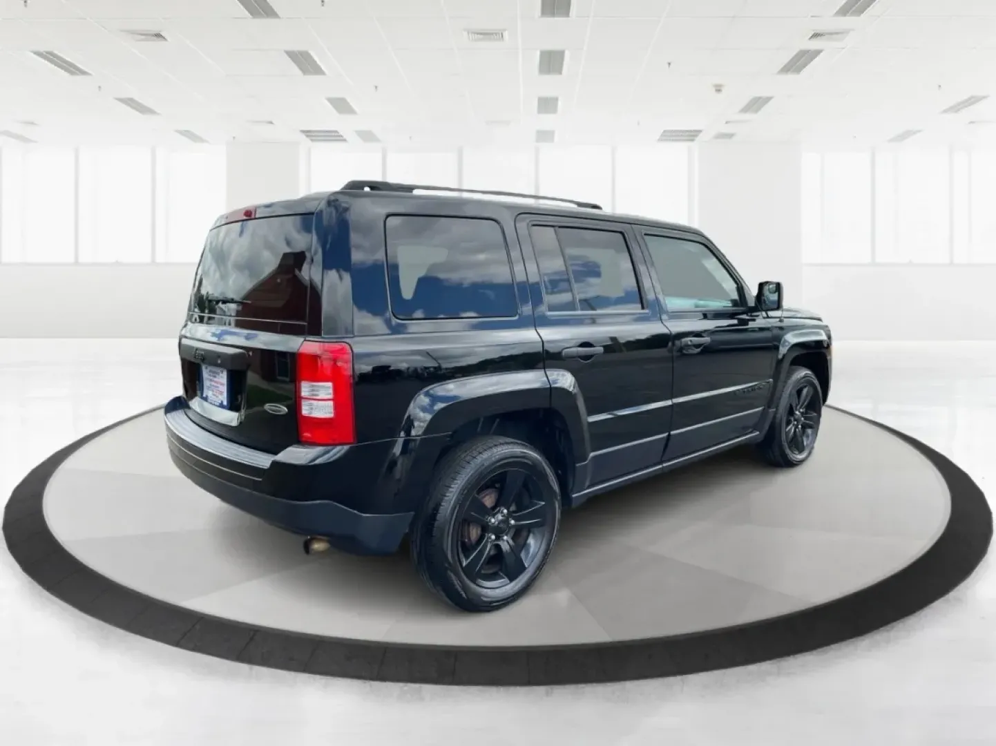 2015 Black Clearcoat Jeep Patriot Sport 2WD (1C4NJPBA6FD) with an 2.0L L4 DOHC 16V engine, located at 1099 N County Rd 25A , Troy, OH, 45373, (937) 908-9800, 40.057079, -84.212883 - **Adventure Awaits in the 2015 Jeep Patriot Your Perfect Companion for Weekend Getaways!**<br /> <br /> Imagine hitting the open road with the wind in your hair, the sound of your favorite playlist filling the cabin, and the freedom to explore every hidden gem along the way. The 2015 Jeep Patriot i - Photo#2
