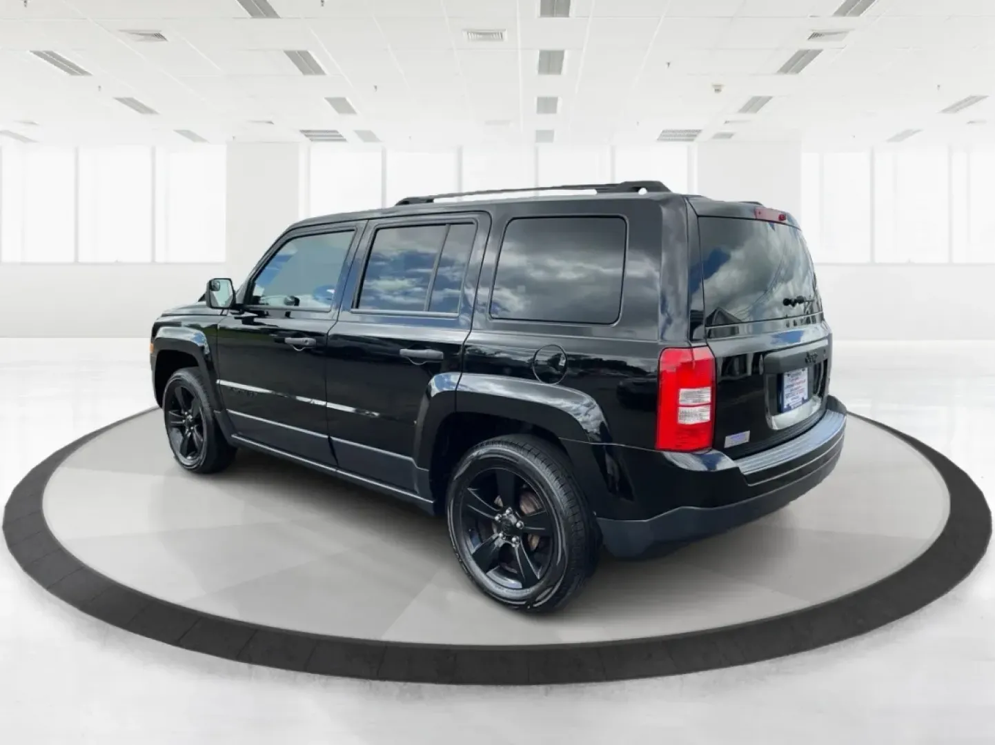 2015 Black Clearcoat Jeep Patriot Sport 2WD (1C4NJPBA6FD) with an 2.0L L4 DOHC 16V engine, located at 1099 N County Rd 25A , Troy, OH, 45373, (937) 908-9800, 40.057079, -84.212883 - **Adventure Awaits in the 2015 Jeep Patriot Your Perfect Companion for Weekend Getaways!**<br /> <br /> Imagine hitting the open road with the wind in your hair, the sound of your favorite playlist filling the cabin, and the freedom to explore every hidden gem along the way. The 2015 Jeep Patriot i - Photo#4