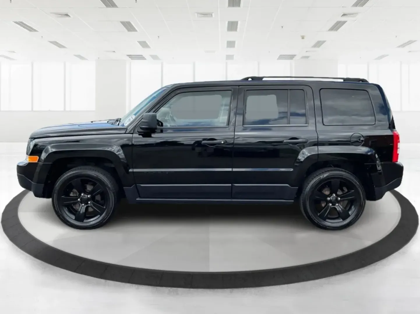 2015 Black Clearcoat Jeep Patriot Sport 2WD (1C4NJPBA6FD) with an 2.0L L4 DOHC 16V engine, located at 1099 N County Rd 25A , Troy, OH, 45373, (937) 908-9800, 40.057079, -84.212883 - **Adventure Awaits in the 2015 Jeep Patriot Your Perfect Companion for Weekend Getaways!**<br /> <br /> Imagine hitting the open road with the wind in your hair, the sound of your favorite playlist filling the cabin, and the freedom to explore every hidden gem along the way. The 2015 Jeep Patriot i - Photo#5
