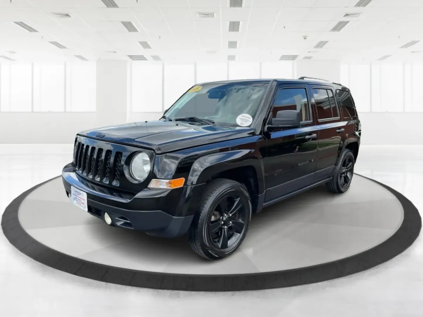 2015 Black Clearcoat Jeep Patriot Sport 2WD (1C4NJPBA6FD) with an 2.0L L4 DOHC 16V engine, located at 1099 N County Rd 25A , Troy, OH, 45373, (937) 908-9800, 40.057079, -84.212883 - **Adventure Awaits in the 2015 Jeep Patriot Your Perfect Companion for Weekend Getaways!**<br /> <br /> Imagine hitting the open road with the wind in your hair, the sound of your favorite playlist filling the cabin, and the freedom to explore every hidden gem along the way. The 2015 Jeep Patriot i - Photo#8