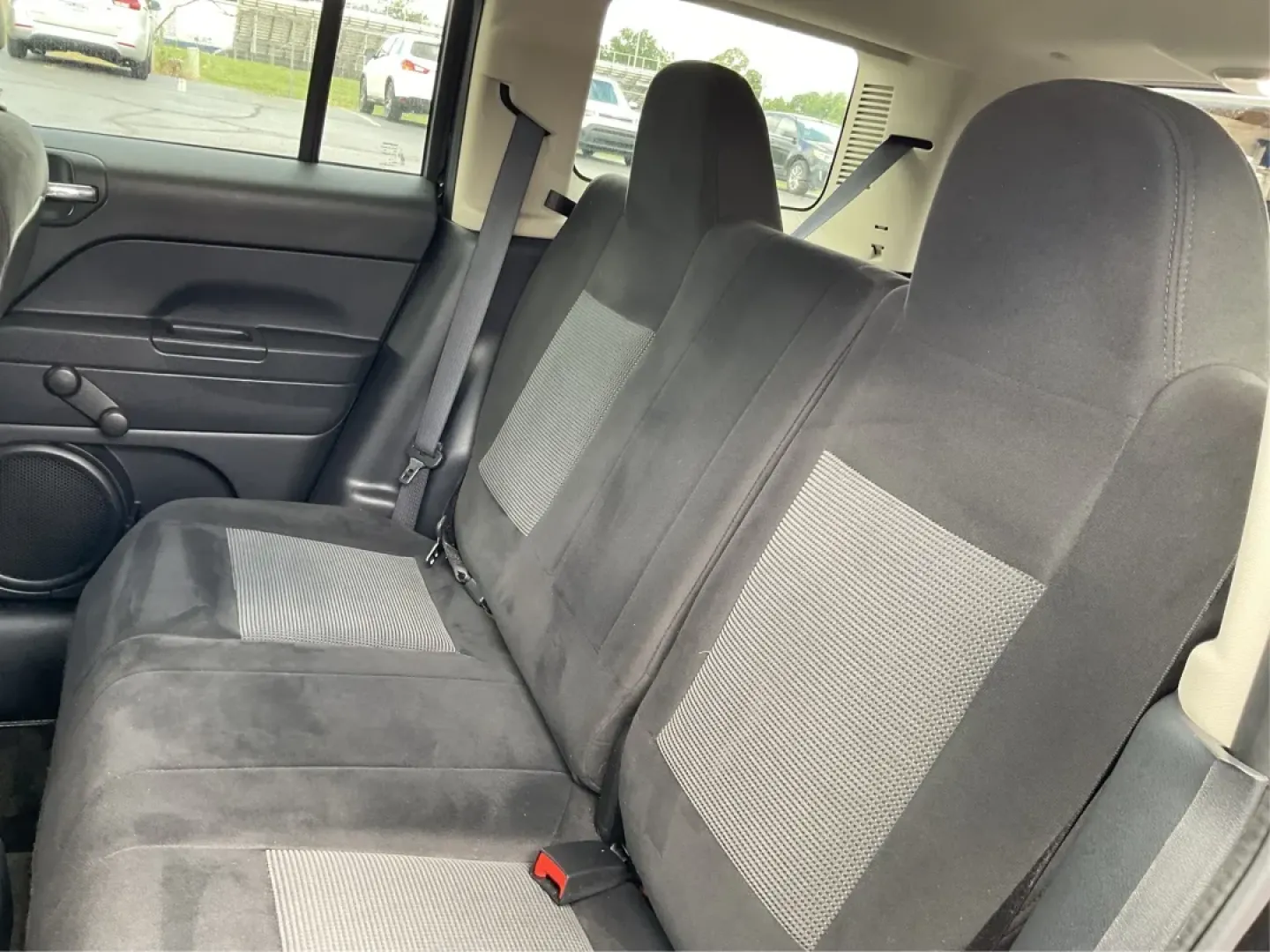 2015 Black Clearcoat Jeep Patriot Sport 2WD (1C4NJPBA6FD) with an 2.0L L4 DOHC 16V engine, located at 1099 N County Rd 25A , Troy, OH, 45373, (937) 908-9800, 40.057079, -84.212883 - **Adventure Awaits in the 2015 Jeep Patriot Your Perfect Companion for Weekend Getaways!**<br /> <br /> Imagine hitting the open road with the wind in your hair, the sound of your favorite playlist filling the cabin, and the freedom to explore every hidden gem along the way. The 2015 Jeep Patriot i - Photo#10
