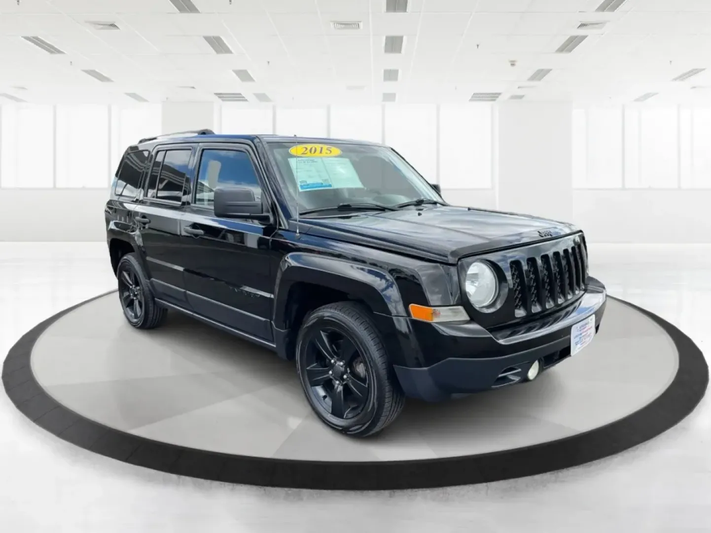 2015 Black Clearcoat Jeep Patriot Sport 2WD (1C4NJPBA6FD) with an 2.0L L4 DOHC 16V engine, located at 1099 N County Rd 25A , Troy, OH, 45373, (937) 908-9800, 40.057079, -84.212883 - **Adventure Awaits in the 2015 Jeep Patriot Your Perfect Companion for Weekend Getaways!**<br /> <br /> Imagine hitting the open road with the wind in your hair, the sound of your favorite playlist filling the cabin, and the freedom to explore every hidden gem along the way. The 2015 Jeep Patriot i - Photo#0
