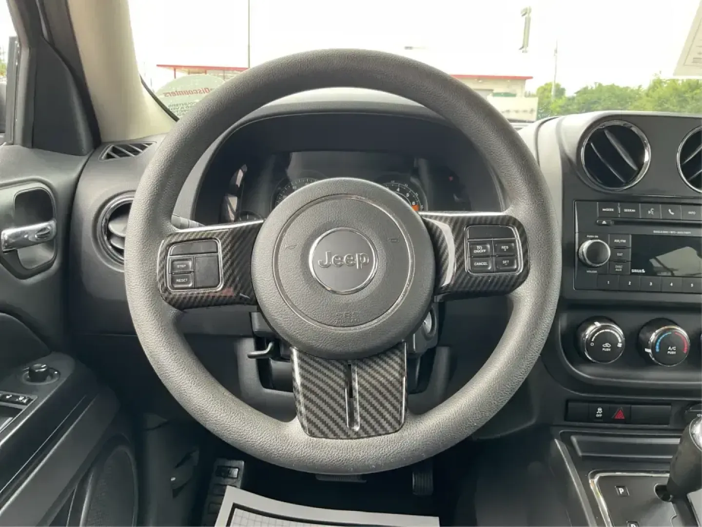2017 Jeep Patriot Sport 2WD (1C4NJPBA4HD) with an 2.0L L4 DOHC 16V engine, Continuously Variable Transmission (CVT) transmission, located at 401 Woodman Dr, Riverside, OH, 45431, (937) 908-9800, 39.760899, -84.123421 - Weekday commute down Woodman Dr, quick runs to the Riverside shopping corridors, and spontaneous weekend escapes toward the Dayton MetroParks all feel easier in an SUV that's compact, comfortable, and ready for everyday life. This 2017 Jeep Patriot Sport FWD is a practical choice for drivers who wan- Photo#16