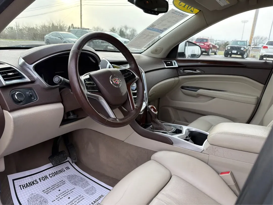 2013 White Cadillac SRX Luxury Collection (3GYFNCE32DS) with an 3.6L V6 DOHC 24V FFV engine, 6-Speed Automatic transmission, located at 8750 N County Rd 25A, Piqua, OH, 45356, (937) 908-9800, 40.164391, -84.232513 - 2013 Cadillac SRX Luxury Collection - Photo#9