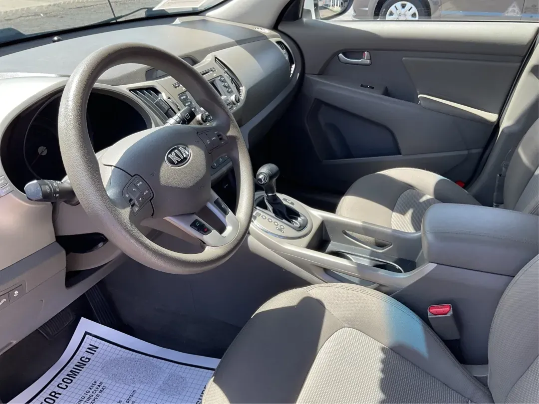 2015 Kia Sportage LX (KNDPBCAC7F7) with an Other engine, located at 4508 South Dixie Dr, Moraine, OH, 45439, (937) 908-9800, 39.689976, -84.218452 - **Explore the Open Road with the 2015 Kia Sportage LX Perfect for Your Next Adventure!**<br /> <br /> Imagine hitting the open road with your loved ones, whether it's a weekend getaway or a daily commute. The 2015 Kia Sportage LX, available at Advantage Car and Credit in Fairborn, OH, is the ideal - Photo#9