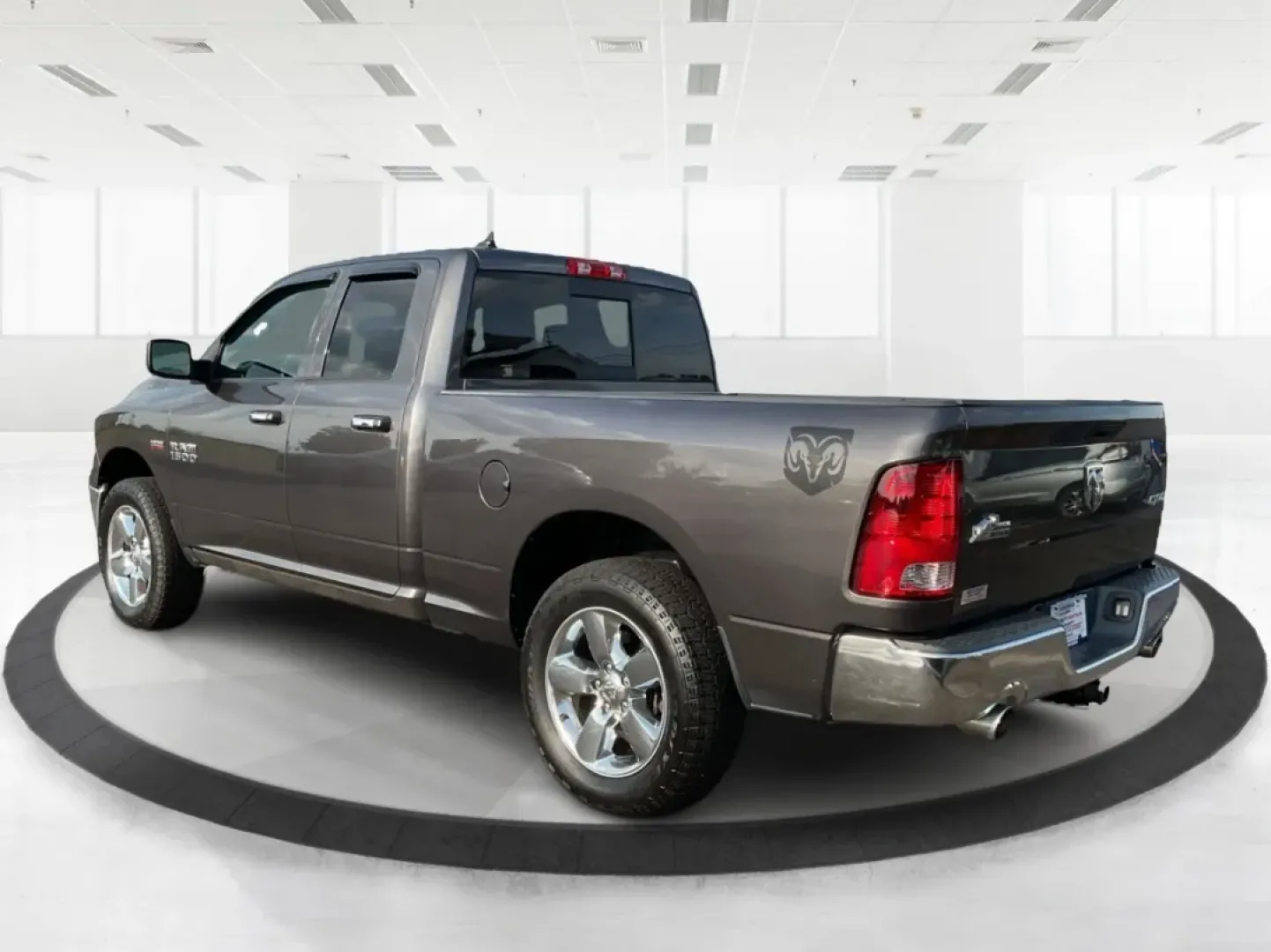 2015 Gray Ram 1500 SLT Quad Cab 4WD (1C6RR7GT3FS) with an 5.7L V8 OHV 16V engine, 8-Speed Automatic transmission, located at 1099 N County Rd 25A , Troy, OH, 45373, (937) 908-9800, 40.057079, -84.212883 - **Experience Adventure and Utility with this 2015 Ram 1500 SLT Quad Cab!**<br /> <br /> Are you ready to elevate your weekend adventures while ensuring your daily commute remains smooth and comfortable? Look no further than this robust 2015 Ram 1500 SLT Quad Cab, now available at Advantage Car and C - Photo#4