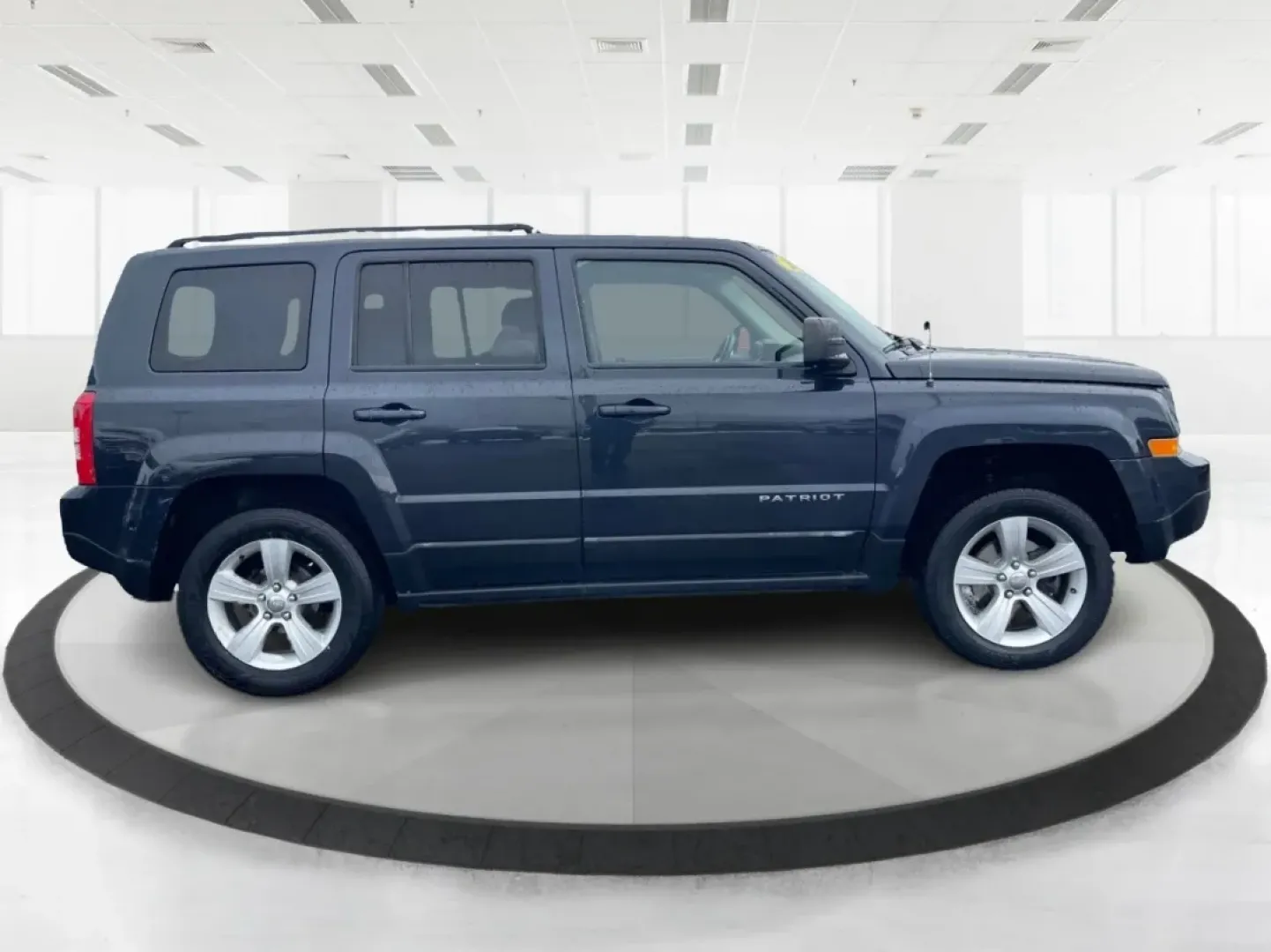 2016 Gray Jeep Patriot Latitude 4WD (1C4NJRFB0GD) with an 2.4L L4 DOHC 16V engine, located at 1951 S Dayton Lakeview Rd., New Carlisle, OH, 45344, (937) 908-9800, 39.890999, -84.050255 - **Unleash the Adventurer in You with the 2016 Jeep Patriot Latitude 4WD!**<br /> <br /> Looking for the perfect vehicle to complement your active lifestyle? Whether you're navigating daily commutes, heading out for weekend getaways, or tackling off-road adventures, the 2016 Jeep Patriot Latitude 4WD - Photo#1
