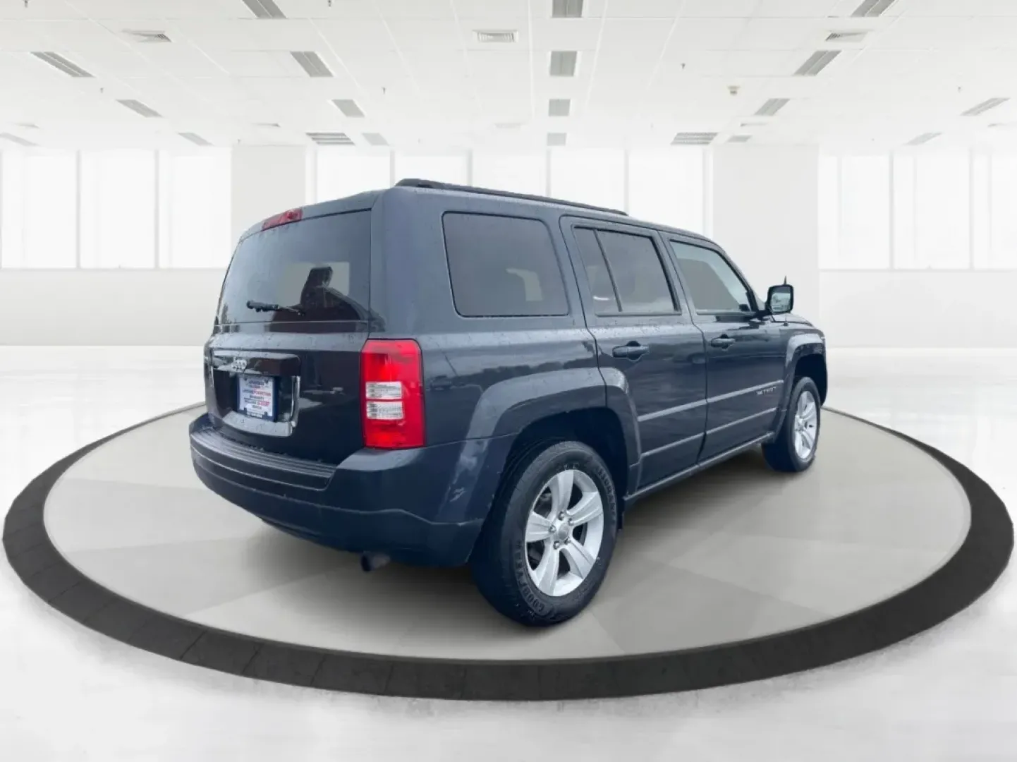 2016 Gray Jeep Patriot Latitude 4WD (1C4NJRFB0GD) with an 2.4L L4 DOHC 16V engine, located at 1951 S Dayton Lakeview Rd., New Carlisle, OH, 45344, (937) 908-9800, 39.890999, -84.050255 - **Unleash the Adventurer in You with the 2016 Jeep Patriot Latitude 4WD!**<br /> <br /> Looking for the perfect vehicle to complement your active lifestyle? Whether you're navigating daily commutes, heading out for weekend getaways, or tackling off-road adventures, the 2016 Jeep Patriot Latitude 4WD - Photo#2