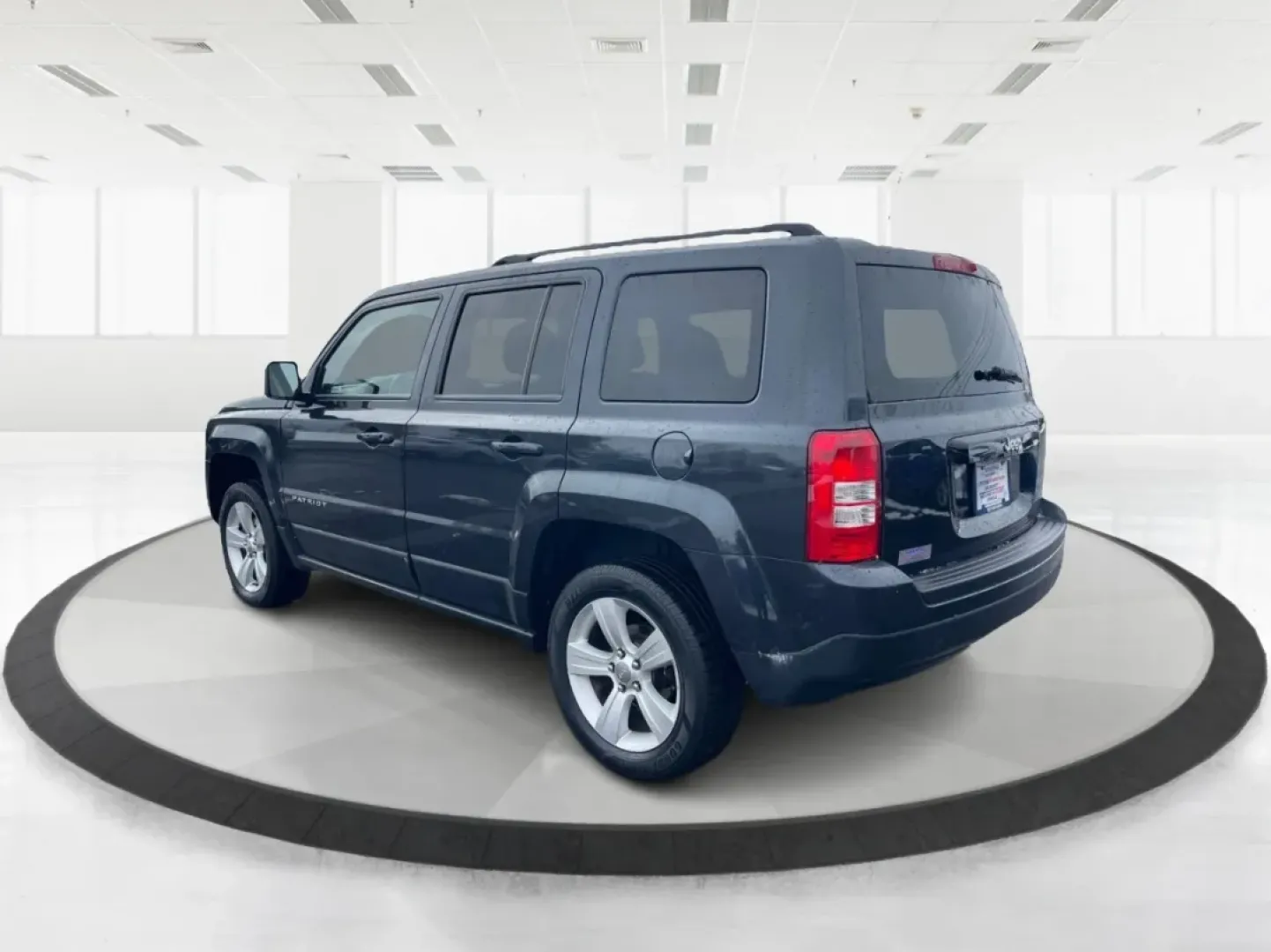 2016 Gray Jeep Patriot Latitude 4WD (1C4NJRFB0GD) with an 2.4L L4 DOHC 16V engine, located at 1951 S Dayton Lakeview Rd., New Carlisle, OH, 45344, (937) 908-9800, 39.890999, -84.050255 - **Unleash the Adventurer in You with the 2016 Jeep Patriot Latitude 4WD!**<br /> <br /> Looking for the perfect vehicle to complement your active lifestyle? Whether you're navigating daily commutes, heading out for weekend getaways, or tackling off-road adventures, the 2016 Jeep Patriot Latitude 4WD - Photo#4