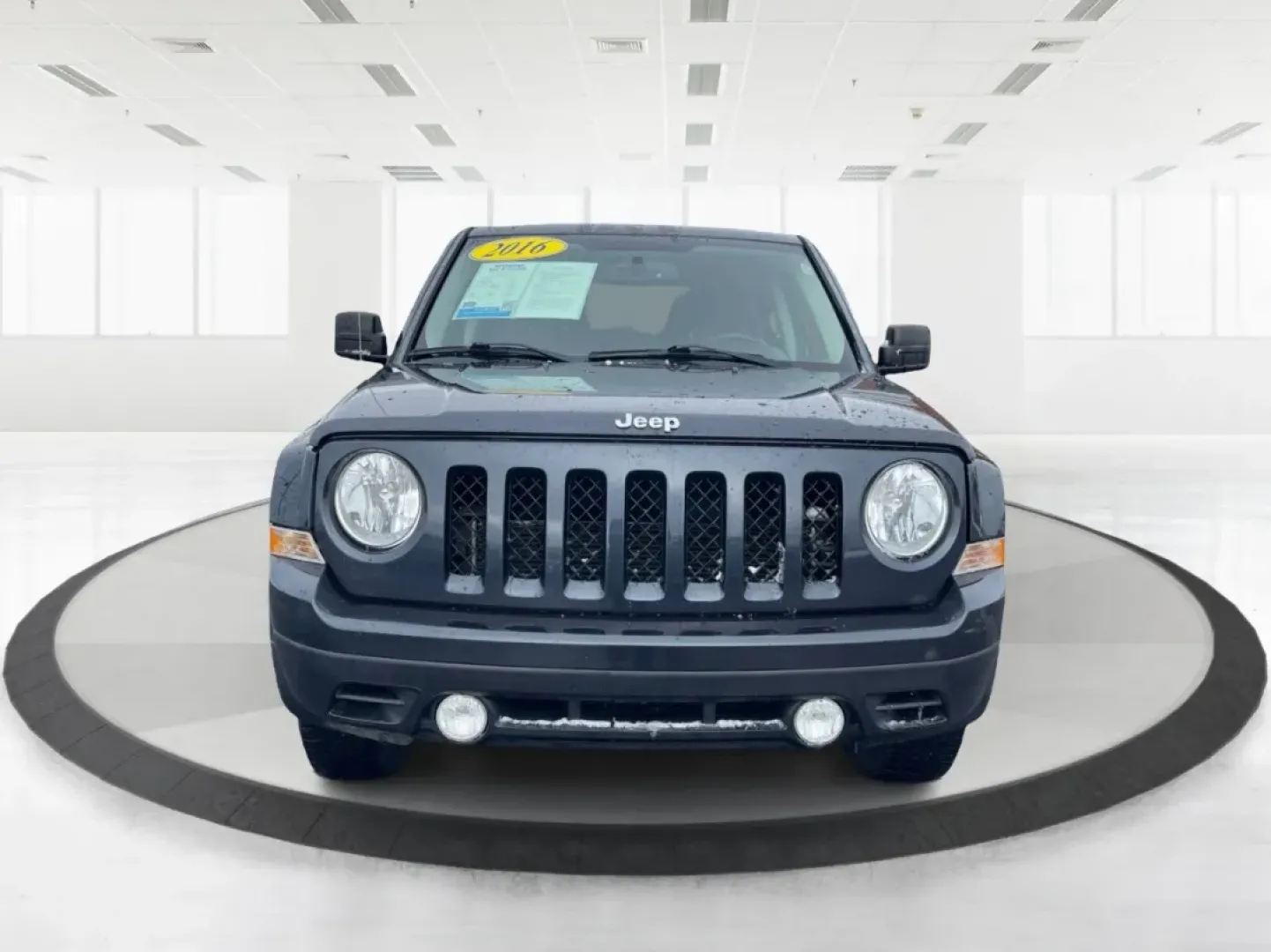 2016 Gray Jeep Patriot Latitude 4WD (1C4NJRFB0GD) with an 2.4L L4 DOHC 16V engine, located at 1951 S Dayton Lakeview Rd., New Carlisle, OH, 45344, (937) 908-9800, 39.890999, -84.050255 - **Unleash the Adventurer in You with the 2016 Jeep Patriot Latitude 4WD!**<br /> <br /> Looking for the perfect vehicle to complement your active lifestyle? Whether you're navigating daily commutes, heading out for weekend getaways, or tackling off-road adventures, the 2016 Jeep Patriot Latitude 4WD - Photo#7