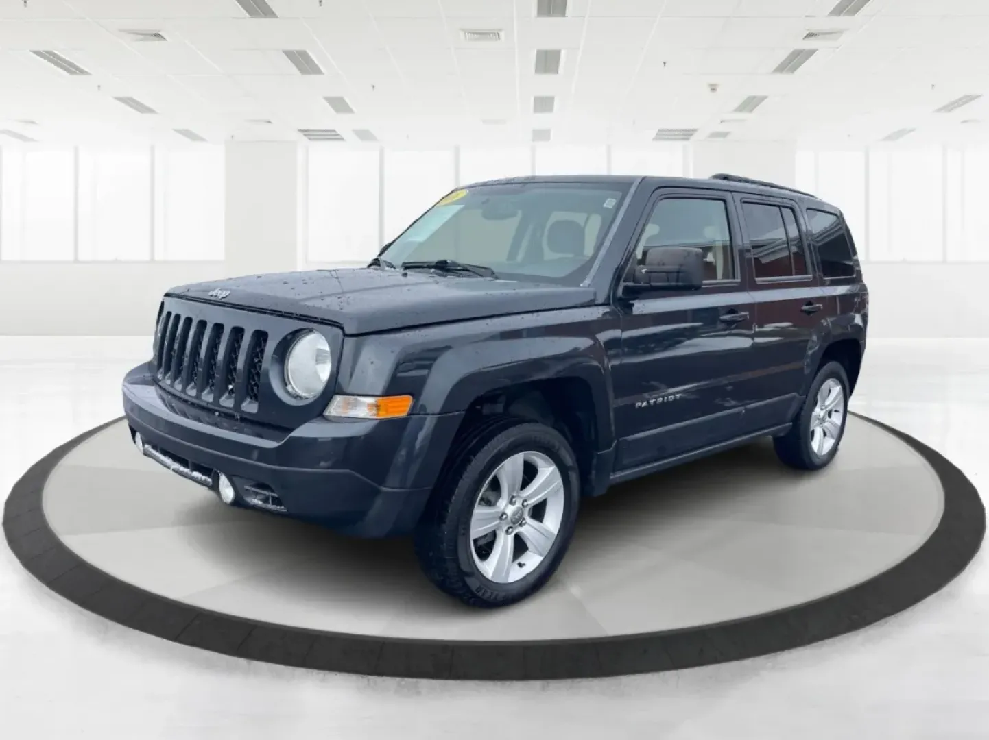 2016 Gray Jeep Patriot Latitude 4WD (1C4NJRFB0GD) with an 2.4L L4 DOHC 16V engine, located at 1951 S Dayton Lakeview Rd., New Carlisle, OH, 45344, (937) 908-9800, 39.890999, -84.050255 - **Unleash the Adventurer in You with the 2016 Jeep Patriot Latitude 4WD!**<br /> <br /> Looking for the perfect vehicle to complement your active lifestyle? Whether you're navigating daily commutes, heading out for weekend getaways, or tackling off-road adventures, the 2016 Jeep Patriot Latitude 4WD - Photo#8