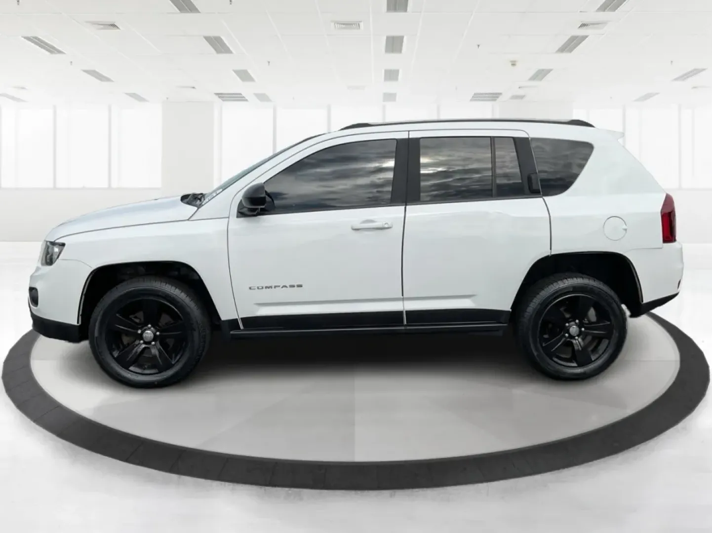 2015 Jeep Compass Sport (1C4NJDBB6FD) with an 2.4L I-4 DOHC engine, located at 880 E. National Road, Vandalia, OH, 45377, (937) 908-9800, 39.891918, -84.183594 - **Explore Adventure and Comfort with the 2015 Jeep Compass Sport at Advantage Car and Credit!**<br /> <br /> Whether you're navigating your daily commute or embarking on a weekend getaway, the 2015 Jeep Compass Sport is designed with versatility in mind. With a spacious interior and rugged capabilit - Photo#5