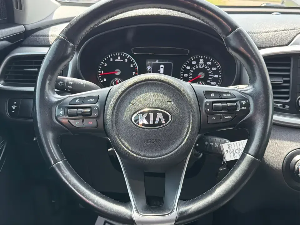 2017 Burgundy Kia Sorento L 2WD (5XYPG4A31HG) with an 2.4L L4 DOHC 16V engine, 6-Speed Automatic transmission, located at 4508 South Dixie Dr, Moraine, OH, 45439, (937) 908-9800, 39.689976, -84.218452 - Pack up the kids, load the groceries, and still have room for a spontaneous weekend escape to Carillon Historical Park or a day exploring Cox Arboretum-this 2017 Kia Sorento L 2WD is the kind of practical SUV that fits real Moraine and Dayton-area life. With three-row versatility in a midsize footpr - Photo#16