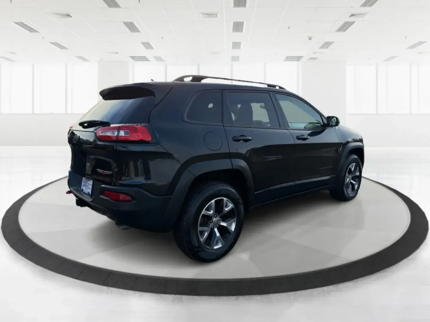 2014 Brilliant Black Crystal P Jeep Cherokee Trailhawk 4WD (1C4PJMBS4EW) with an 3.2L V6 DOHC 24V engine, 9-Speed Automatic transmission, located at 4508 South Dixie Dr, Moraine, OH, 45439, (937) 908-9800, 39.689976, -84.218452 - **Explore New Horizons with the 2014 Jeep Cherokee Trailhawk Your Adventure Awaits!**<br /> <br /> Looking for a vehicle that can keep up with your adventurous spirit while still being suitable for everyday life? Look no further than the 2014 Jeep Cherokee Trailhawk! This capable crossover SUV is p - Photo#2