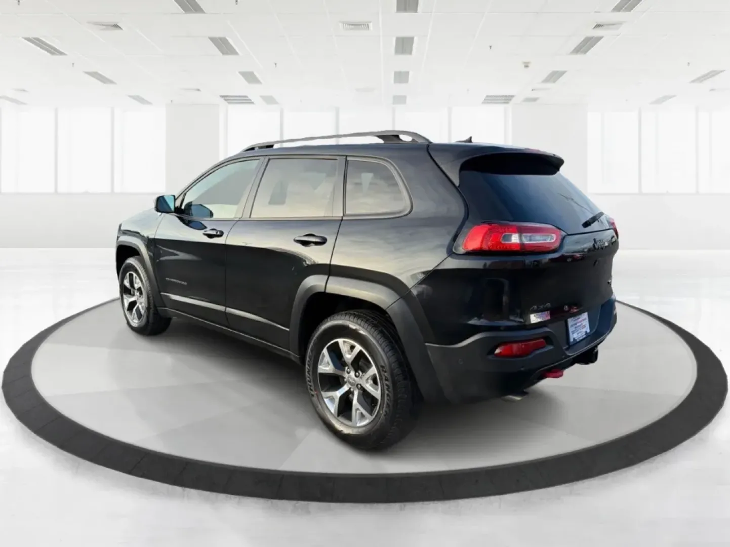 2014 Brilliant Black Crystal P Jeep Cherokee Trailhawk 4WD (1C4PJMBS4EW) with an 3.2L V6 DOHC 24V engine, 9-Speed Automatic transmission, located at 4508 South Dixie Dr, Moraine, OH, 45439, (937) 908-9800, 39.689976, -84.218452 - **Explore New Horizons with the 2014 Jeep Cherokee Trailhawk Your Adventure Awaits!**<br /> <br /> Looking for a vehicle that can keep up with your adventurous spirit while still being suitable for everyday life? Look no further than the 2014 Jeep Cherokee Trailhawk! This capable crossover SUV is p - Photo#4