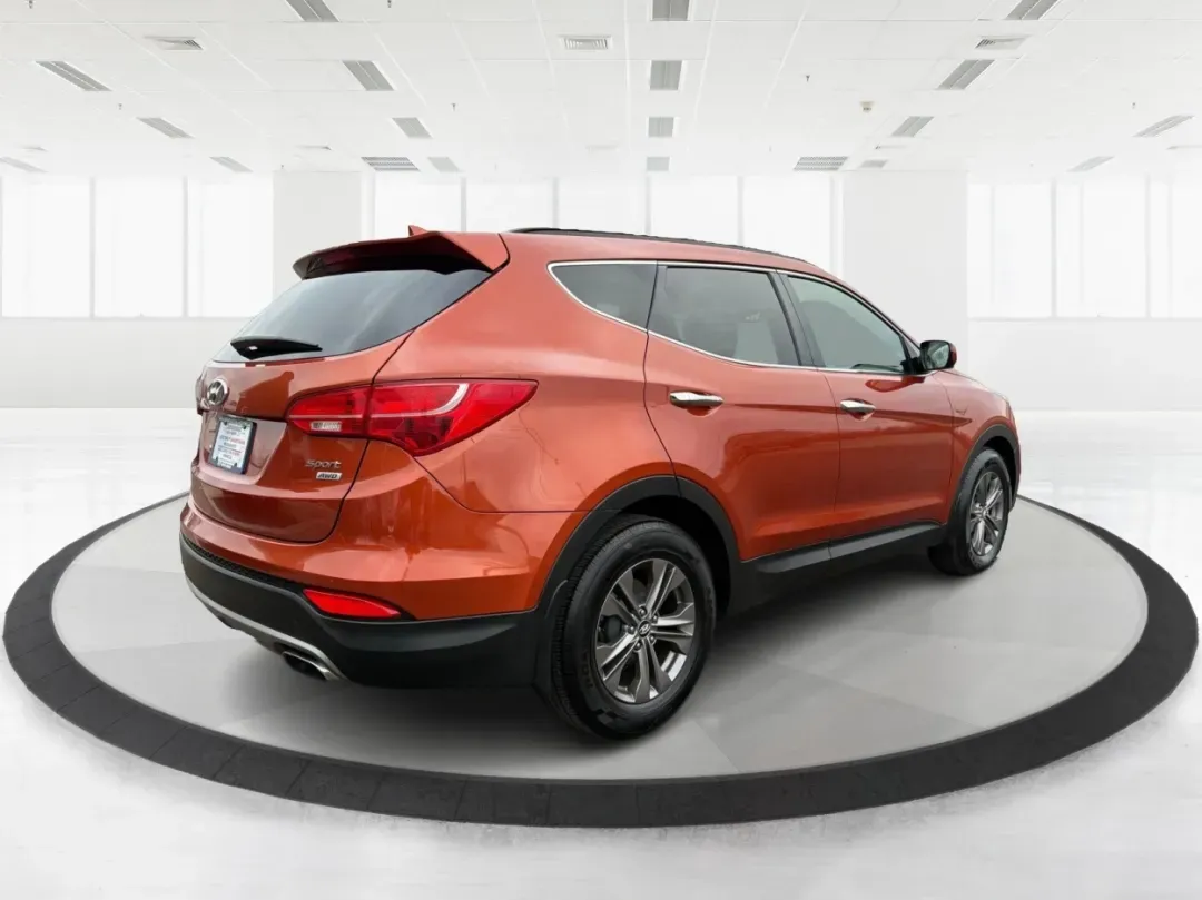 2013 Hyundai Santa Fe Sport 2.4 AWD (5XYZUDLB7DG) with an 2.4L L4 DOHC 16V engine, 6-Speed Automatic transmission, located at 401 Woodman Dr, Riverside, OH, 45431, (937) 908-9800, 39.760899, -84.123421 - **Experience the Freedom of Adventure with the 2013 Hyundai Santa Fe Sport AWD at Advantage Car and Credit - Riverside!**<br /> <br /> Are you ready to elevate your family's adventures or tackle your daily commutes with style and comfort? The 2013 Hyundai Santa Fe Sport 2.4 AWD is the perfect vehicl - Photo#2