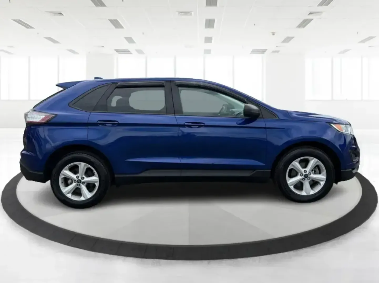 2015 Ford Edge SE FWD (2FMTK3G98FB) with an 2.0L L4 DOHC 16V engine, 6-Speed Automatic transmission, located at 401 Woodman Dr, Riverside, OH, 45431, (937) 908-9800, 39.760899, -84.123421 - Need an SUV that fits real life in the Miami Valley-school drop-offs, a steady commute down I75, and weekend errands that somehow turn into a full cargo load? This 2015 Ford Edge SE FWD is built for everyday versatility, with comfortable seating for five, a roomy cabin, and practical tech that helps- Photo#1