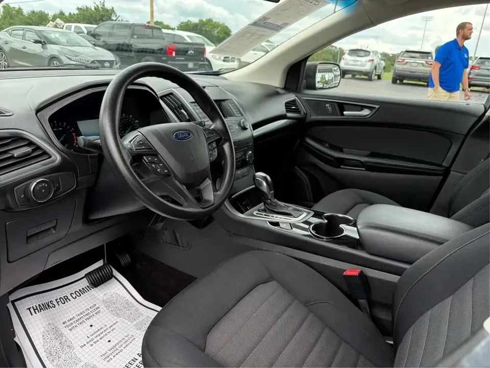 2015 Ford Edge SE FWD (2FMTK3G98FB) with an 2.0L L4 DOHC 16V engine, 6-Speed Automatic transmission, located at 8750 N County Rd 25A, Piqua, OH, 45356, (937) 908-9800, 40.164391, -84.232513 - Need an SUV that fits real life in the Miami Valley-school drop-offs, a steady commute down I75, and weekend errands that somehow turn into a full cargo load? This 2015 Ford Edge SE FWD is built for everyday versatility, with comfortable seating for five, a roomy cabin, and practical tech that helps- Photo#9