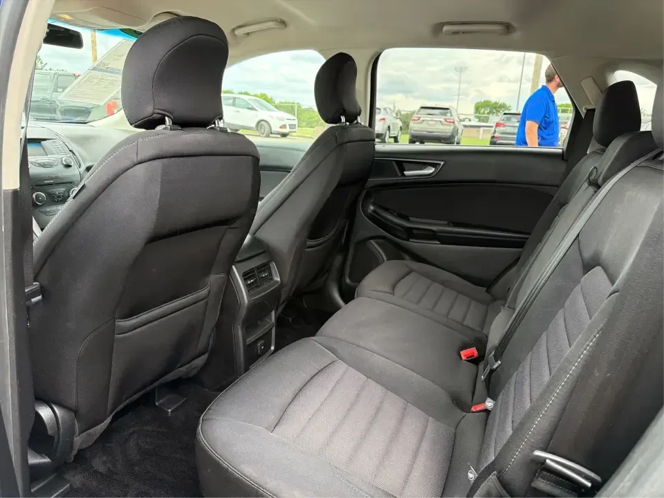 2015 Ford Edge SE FWD (2FMTK3G98FB) with an 2.0L L4 DOHC 16V engine, 6-Speed Automatic transmission, located at 8750 N County Rd 25A, Piqua, OH, 45356, (937) 908-9800, 40.164391, -84.232513 - Need an SUV that fits real life in the Miami Valley-school drop-offs, a steady commute down I75, and weekend errands that somehow turn into a full cargo load? This 2015 Ford Edge SE FWD is built for everyday versatility, with comfortable seating for five, a roomy cabin, and practical tech that helps- Photo#10