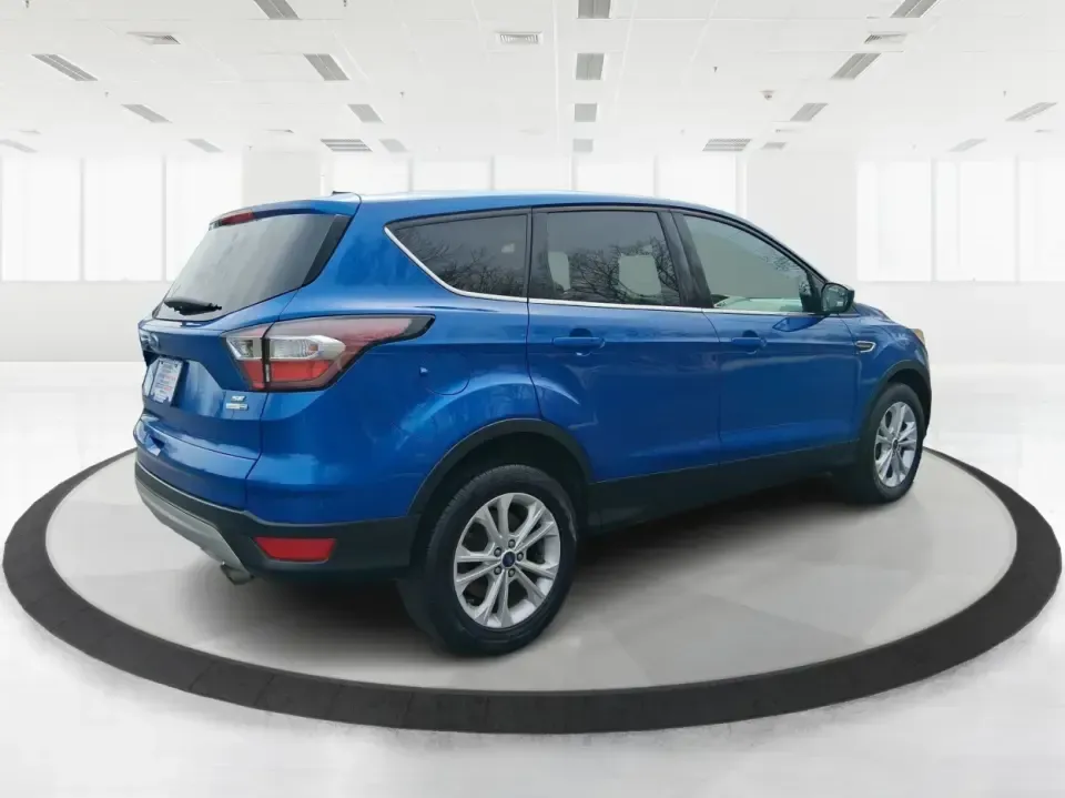 2017 Ford Escape SE 4WD (1FMCU9G93HU) with an 2.0L L4 DOHC 16V engine, 6-Speed Automatic transmission, located at 1230 East Main St, Xenia, OH, 45385, (937) 908-9800, 39.688026, -83.910172 - Discover the ultimate blend of comfort, capability, and style with the 2017 Ford Escape SE 4WD, a perfect companion for families on the go or adventurers seeking their next weekend thrill. With its spacious interior and robust features, this SUV is designed for those who lead an active lifestyle, ma - Photo#2