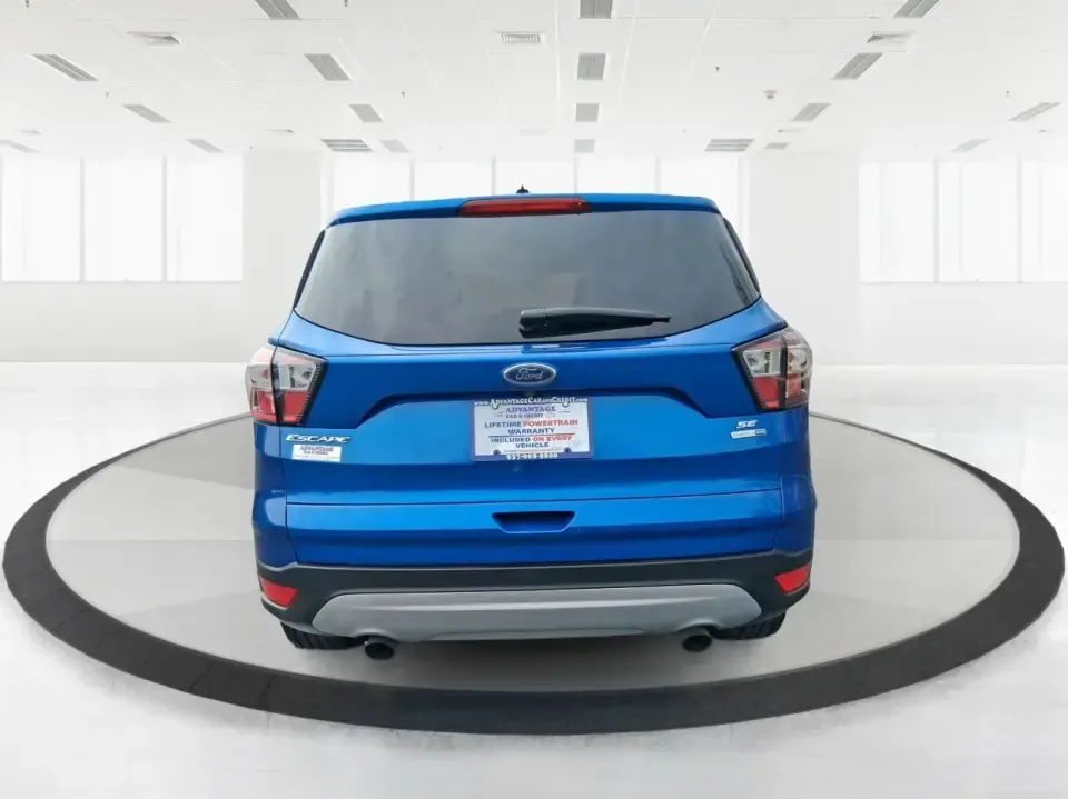 2017 Ford Escape SE 4WD (1FMCU9G93HU) with an 2.0L L4 DOHC 16V engine, 6-Speed Automatic transmission, located at 1230 East Main St, Xenia, OH, 45385, (937) 908-9800, 39.688026, -83.910172 - Discover the ultimate blend of comfort, capability, and style with the 2017 Ford Escape SE 4WD, a perfect companion for families on the go or adventurers seeking their next weekend thrill. With its spacious interior and robust features, this SUV is designed for those who lead an active lifestyle, ma - Photo#3