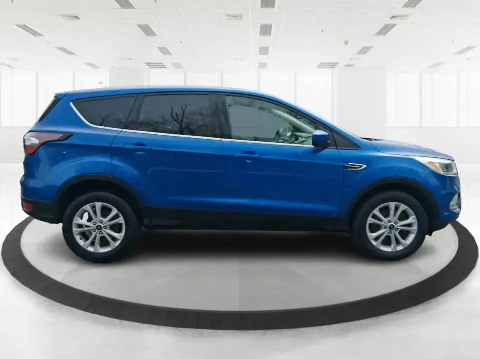 2017 Ford Escape SE 4WD (1FMCU9G93HU) with an 2.0L L4 DOHC 16V engine, 6-Speed Automatic transmission, located at 1099 N County Rd 25A , Troy, OH, 45373, (937) 908-9800, 40.057079, -84.212883 - Discover the ultimate blend of comfort, capability, and style with the 2017 Ford Escape SE 4WD, a perfect companion for families on the go or adventurers seeking their next weekend thrill. With its spacious interior and robust features, this SUV is designed for those who lead an active lifestyle, ma - Photo#1