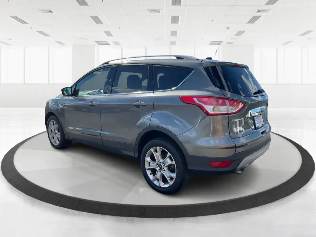 2014 Ford Escape Titanium 4WD (1FMCU9J92EU) with an 2.0L L4 DOHC 16V engine, 6-Speed Automatic transmission, located at 401 Woodman Dr, Riverside, OH, 45431, (937) 908-9800, 39.760899, -84.123421 - Looking for a versatile vehicle that accommodates your dynamic lifestyle? Meet the 2014 Ford Escape Titanium, the perfect SUV for growing families, adventurous souls, and budget-conscious buyers alike! With its impressive blend of performance, comfort, and cutting-edge technology, this Ford Escape i - Photo#4