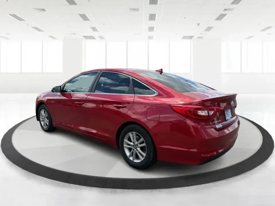 2017 Hyundai Sonata SE (5NPE24AF8HH) with an 2.4L L4 DOHC 16V engine, 7-Speed Automatic transmission, located at 8750 N County Rd 25A, Piqua, OH, 45356, (937) 908-9800, 40.164391, -84.232513 - Ready for a dependable commuter that still looks sharp pulling into work, school pickup, or a weekend dinner in town? This Scarlet Red 2017 Hyundai Sonata SE is a practical, comfortable sedan that fits real-life schedules in Piqua, Ohio-whether you're cruising up N County Rd 25A, heading toward I75 - Photo#4