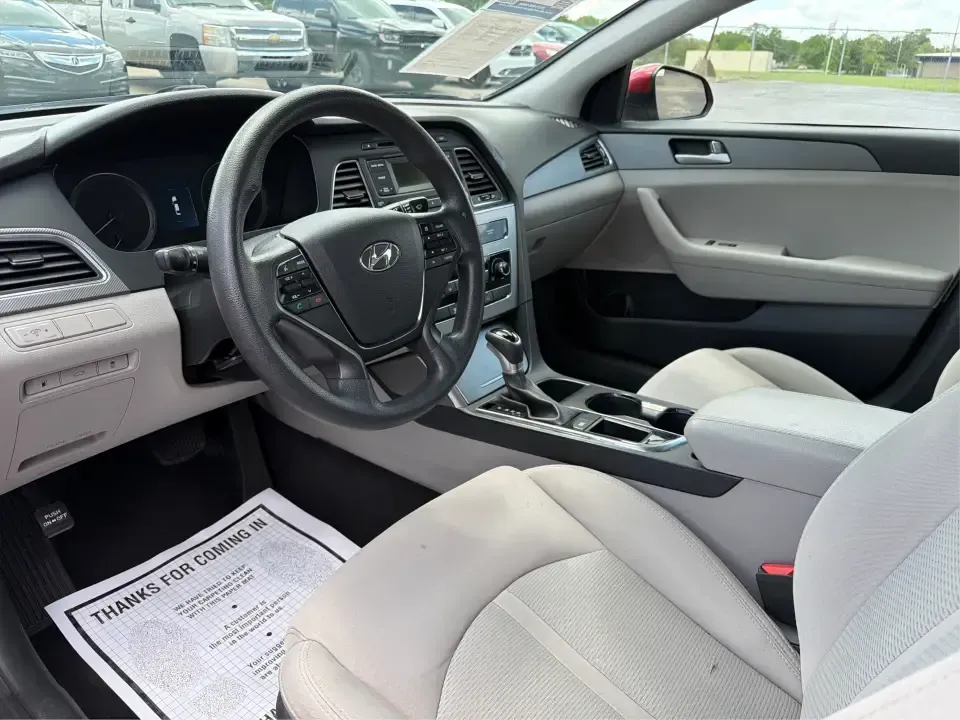 2017 Hyundai Sonata SE (5NPE24AF8HH) with an 2.4L L4 DOHC 16V engine, 7-Speed Automatic transmission, located at 8750 N County Rd 25A, Piqua, OH, 45356, (937) 908-9800, 40.164391, -84.232513 - Ready for a dependable commuter that still looks sharp pulling into work, school pickup, or a weekend dinner in town? This Scarlet Red 2017 Hyundai Sonata SE is a practical, comfortable sedan that fits real-life schedules in Piqua, Ohio-whether you're cruising up N County Rd 25A, heading toward I75 - Photo#9