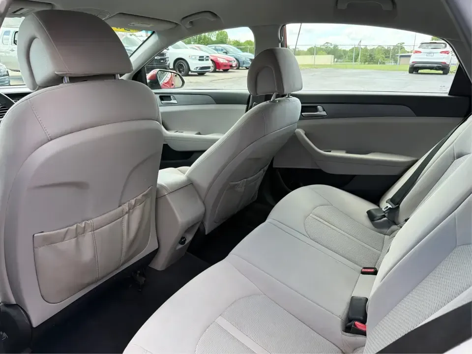 2017 Hyundai Sonata SE (5NPE24AF8HH) with an 2.4L L4 DOHC 16V engine, 7-Speed Automatic transmission, located at 8750 N County Rd 25A, Piqua, OH, 45356, (937) 908-9800, 40.164391, -84.232513 - Ready for a dependable commuter that still looks sharp pulling into work, school pickup, or a weekend dinner in town? This Scarlet Red 2017 Hyundai Sonata SE is a practical, comfortable sedan that fits real-life schedules in Piqua, Ohio-whether you're cruising up N County Rd 25A, heading toward I75 - Photo#10