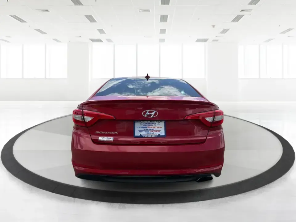 2017 Hyundai Sonata SE (5NPE24AF8HH) with an 2.4L L4 DOHC 16V engine, 7-Speed Automatic transmission, located at 1951 S Dayton Lakeview Rd., New Carlisle, OH, 45344, (937) 908-9800, 39.890999, -84.050255 - Ready for a dependable commuter that still looks sharp pulling into work, school pickup, or a weekend dinner in town? This Scarlet Red 2017 Hyundai Sonata SE is a practical, comfortable sedan that fits real-life schedules in Piqua, Ohio-whether you're cruising up N County Rd 25A, heading toward I75 - Photo#3