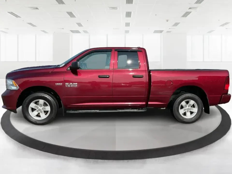 2018 Ram 1500 Express Quad Cab 4x4 6'4 Box (1C6RR7FT8JS) with an 5.7L V8 OHV 16V engine, 8A transmission, located at 1099 N County Rd 25A , Troy, OH, 45373, (937) 908-9800, 40.057079, -84.212883 - Are you ready to elevate your adventures and tackle any terrain with confidence? The 2018 Ram 1500 Express Quad Cab 4x4 is the ultimate truck for weekend warriors and daily commuters alike, offering the perfect blend of power, versatility, and style. With a striking Delmonico Red Pearlcoat exterior - Photo#5