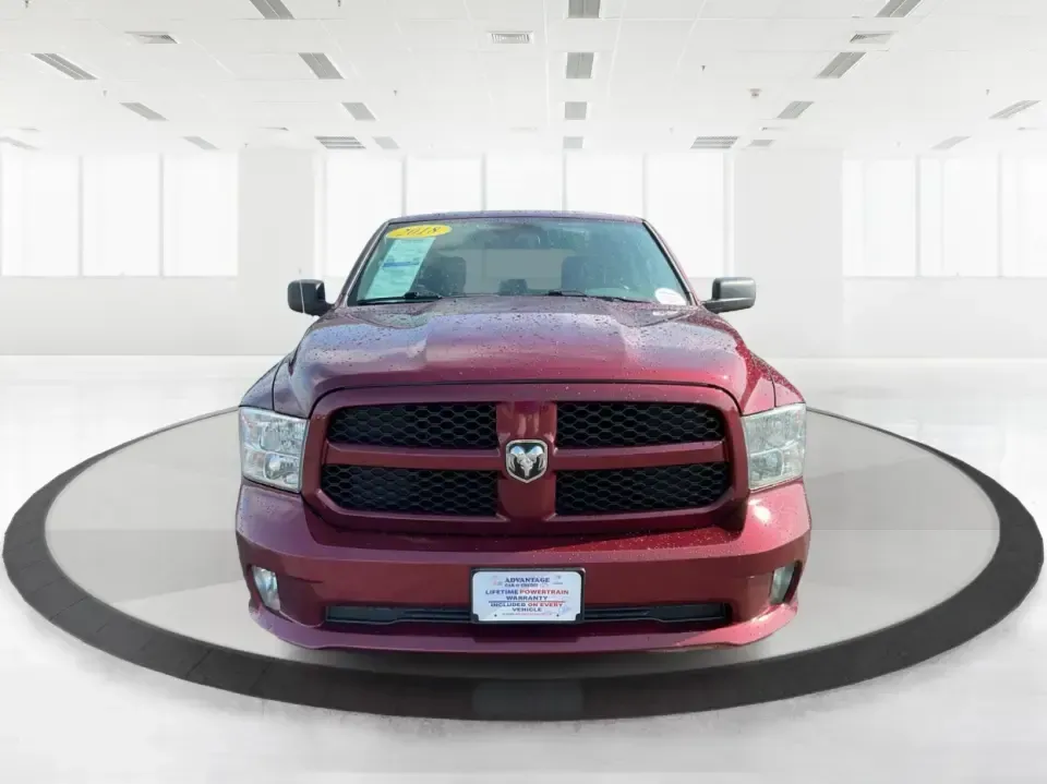 2018 Ram 1500 Express Quad Cab 4x4 6'4 Box (1C6RR7FT8JS) with an 5.7L V8 OHV 16V engine, 8A transmission, located at 1099 N County Rd 25A , Troy, OH, 45373, (937) 908-9800, 40.057079, -84.212883 - Are you ready to elevate your adventures and tackle any terrain with confidence? The 2018 Ram 1500 Express Quad Cab 4x4 is the ultimate truck for weekend warriors and daily commuters alike, offering the perfect blend of power, versatility, and style. With a striking Delmonico Red Pearlcoat exterior - Photo#7