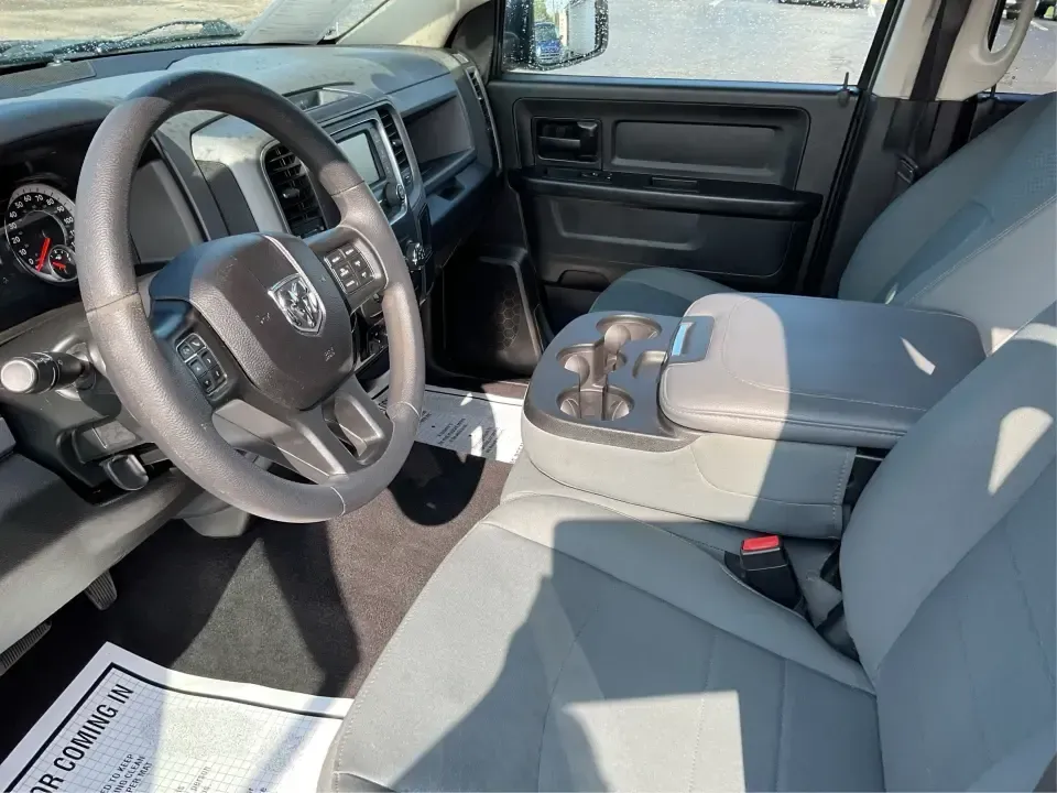 2018 Ram 1500 Express Quad Cab 4x4 6'4 Box (1C6RR7FT8JS) with an 5.7L V8 OHV 16V engine, 8A transmission, located at 1099 N County Rd 25A , Troy, OH, 45373, (937) 908-9800, 40.057079, -84.212883 - Are you ready to elevate your adventures and tackle any terrain with confidence? The 2018 Ram 1500 Express Quad Cab 4x4 is the ultimate truck for weekend warriors and daily commuters alike, offering the perfect blend of power, versatility, and style. With a striking Delmonico Red Pearlcoat exterior - Photo#9