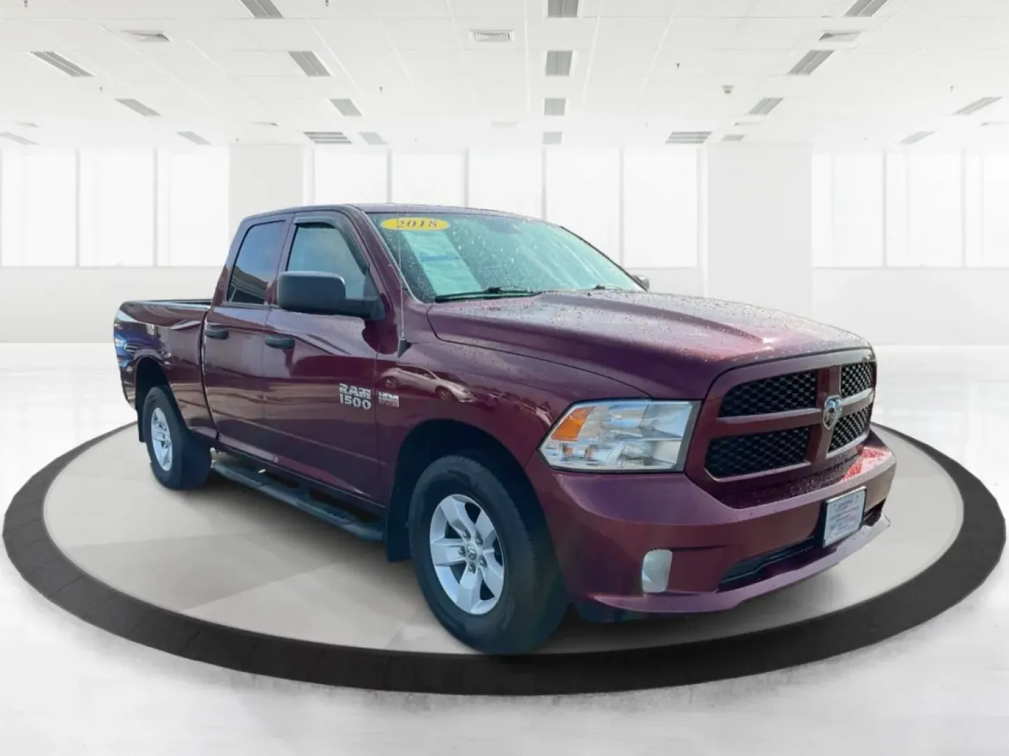 2018 Ram 1500 Express Quad Cab 4x4 6'4 Box (1C6RR7FT8JS) with an Other engine, located at 8750 N County Rd 25A, Piqua, OH, 45356, (937) 908-9800, 40.164391, -84.232513 - Are you ready to elevate your adventures and tackle any terrain with confidence? The 2018 Ram 1500 Express Quad Cab 4x4 is the ultimate truck for weekend warriors and daily commuters alike, offering the perfect blend of power, versatility, and style. With a striking Delmonico Red Pearlcoat exterior - Photo#0
