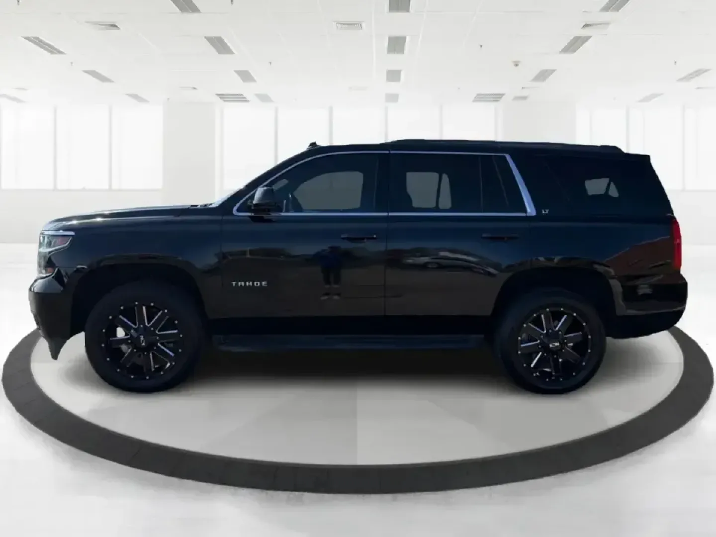 2015 Chevrolet Tahoe LT (1GNSKBKC1FR) with an EcoTec3 5.3L V-8 gasoline direct injection engine, 6-Speed Automatic transmission, located at 8750 N County Rd 25A, Piqua, OH, 45356, (937) 908-9800, 40.164391, -84.232513 - Big weekends, big families, and big Ohio road trips call for a full-size SUV that can handle it all-and this **2015 Chevrolet Tahoe LT 4WD** is built for exactly that lifestyle. Whether you're loading up for a day at **Indian Lake**, hauling sports gear across town, or cruising I75 for a long commut - Photo#5