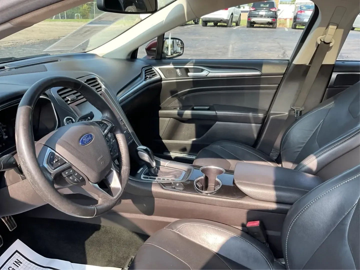 2016 Ford Fusion Titanium (3FA6P0K92GR) with an EcoBoost 2L I-4 gasoline direct injection engine, located at 1099 N County Rd 25A , Troy, OH, 45373, (937) 908-9800, 40.057079, -84.212883 - **Elevate Your Driving Experience with the 2016 Ford Fusion Titanium Where Style Meets Functionality!**<br /> <br /> Are you searching for the perfect blend of style, comfort, and advanced technology for your daily commute or weekend getaways? Look no further than the stunning 2016 Ford Fusion Tita - Photo#9