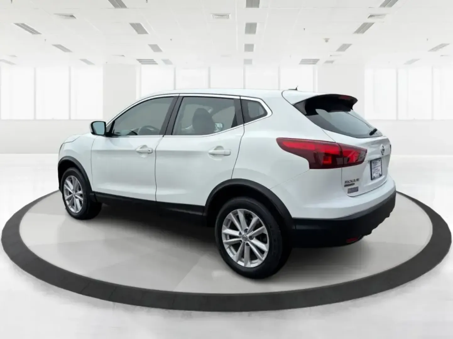 2018 Nissan Rogue S (JN1BJ1CRXJW) with an 2L I-4 gasoline direct injection engine, CVT transmission, located at 1099 N County Rd 25A , Troy, OH, 45373, (937) 908-9800, 40.057079, -84.212883 - Pack up the kids, load the groceries, or point the hood toward a weekend getaway-this 2018 Nissan Rogue S in Glacier White is the kind of everyday SUV that fits real life in Troy. With a comfortable cabin, practical cargo space, and confidence-inspiring AWD capability, it's ideal for long commutes, - Photo#4