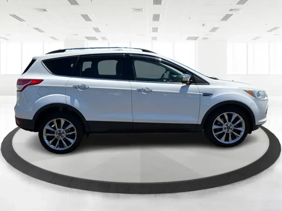 2015 Ford Escape SE (1FMCU9G92FU) with an EcoBoost 1.6L I-4 gasoline direct injection engine, 6-Speed Automatic transmission, located at 401 Woodman Dr, Riverside, OH, 45431, (937) 908-9800, 39.760899, -84.123421 - Need a do-it-all SUV for Dayton-area commutes, school drop-offs, and spontaneous weekend getaways? This 2015 Ford Escape SE 4WD is built for real life in Riverside, Ohio-comfortable for daily runs down Woodman Dr, confident on slick winter mornings, and efficient enough for longer drives toward Down - Photo#1